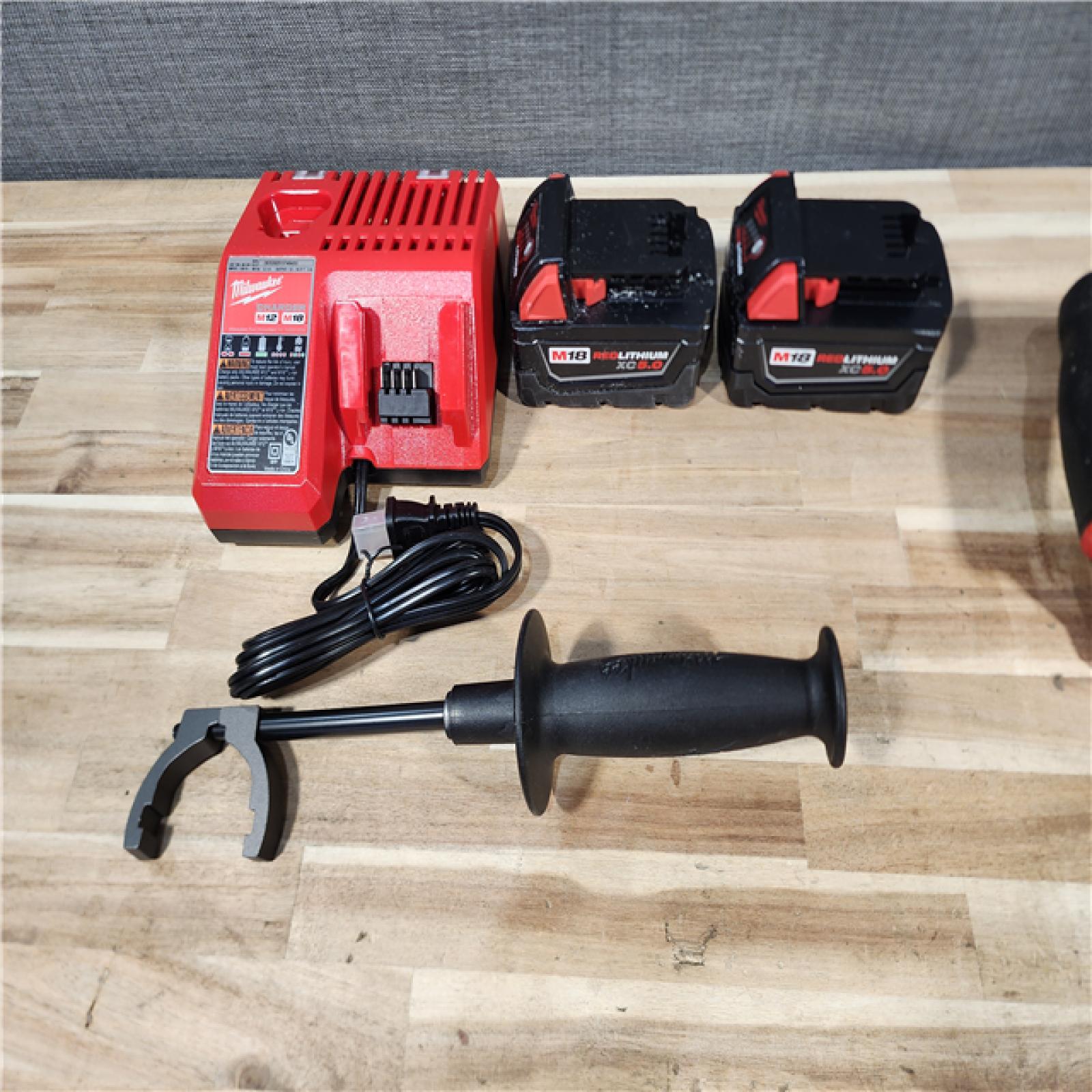 HOUSTON LOCATION - AS-IS M18 FUEL 18V Lithium-Ion Brushless Cordless Combo Kit (3-Tool) with Two 5.0 Ah Batteries  1 Charger 1 Tool Bag