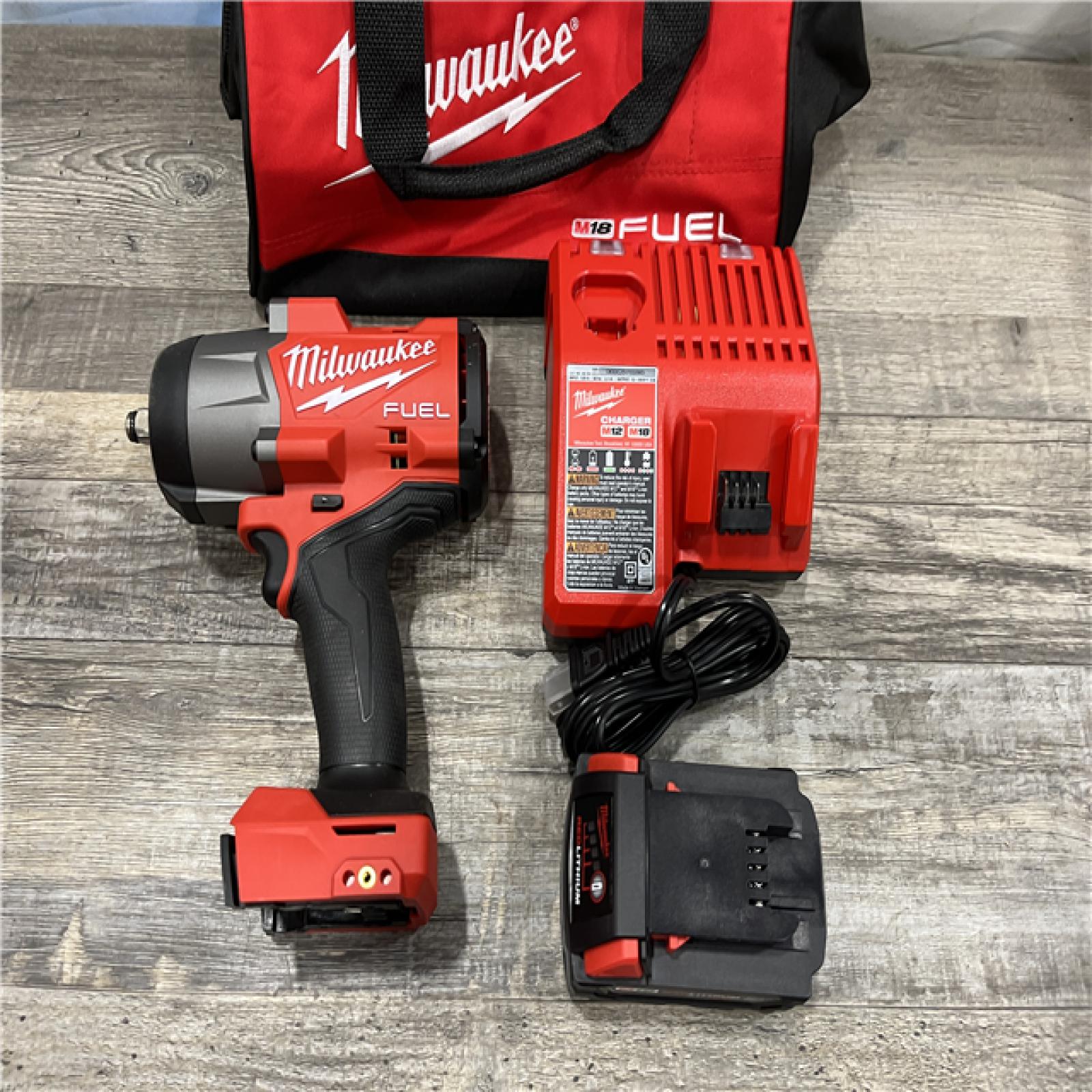 AS-IS Milwaukee FUEL 18V Lithium-Ion Brushless Cordless 1/2 in. Impact Wrench w/Friction Ring Kit