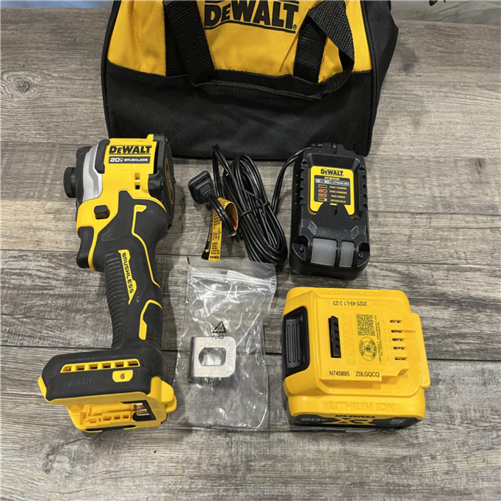 AS-IS DEWALT ATOMIC 20V MAX Lithium-Ion Cordless 1/4 in. Brushless Impact Driver Kit