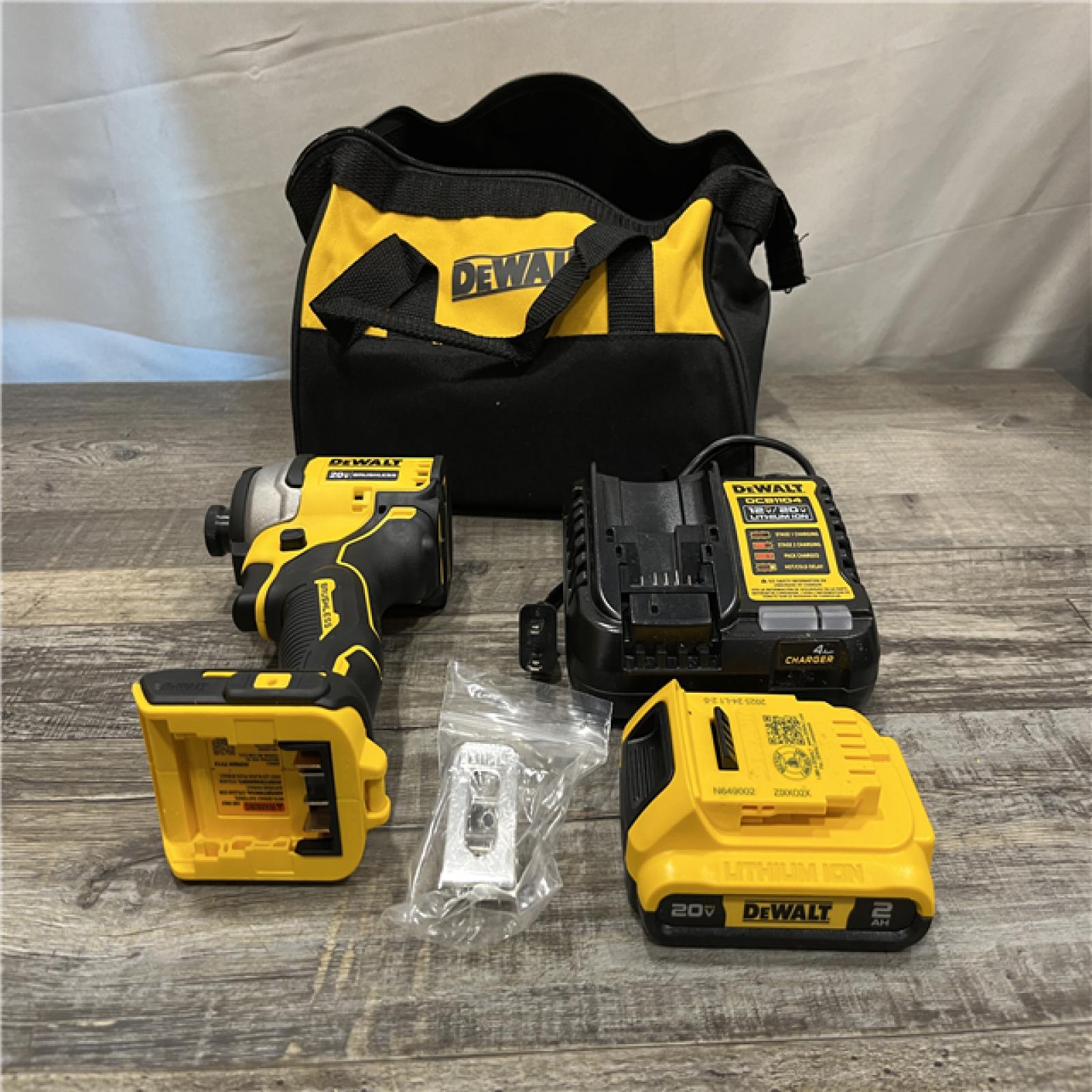 AS-IS DEWALT Atomic 20V Max Lithium-Ion Brushless Cordless Compact 1/4 in. Impact Driver Kit