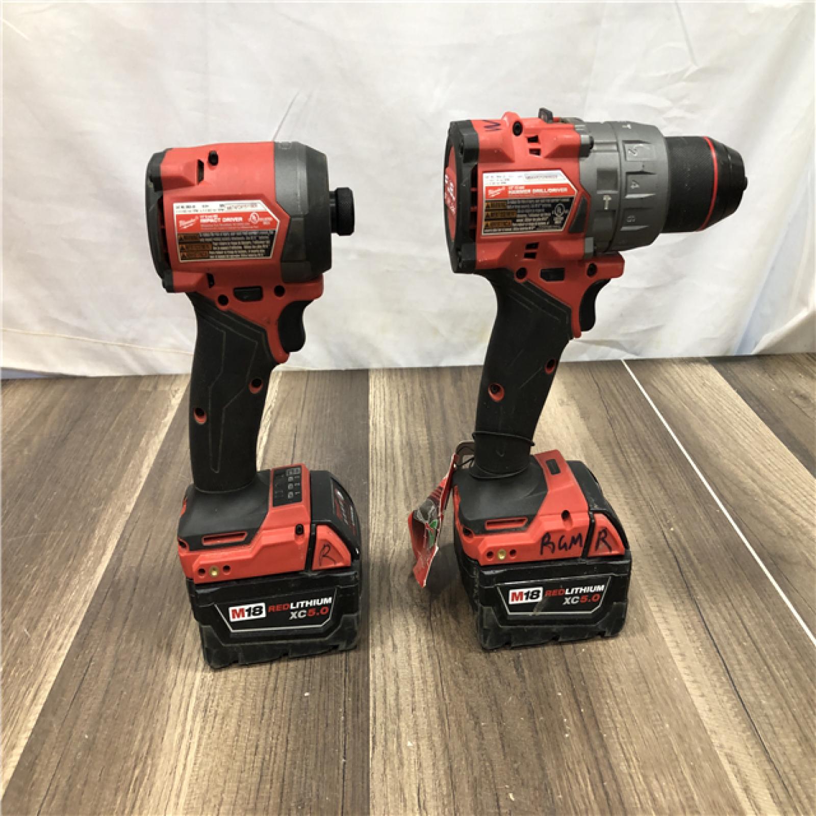 AS-IS Milwaukee FUEL 18V Lithium-Ion Brushless Cordless Hammer Drill and Impact Driver Combo Kit