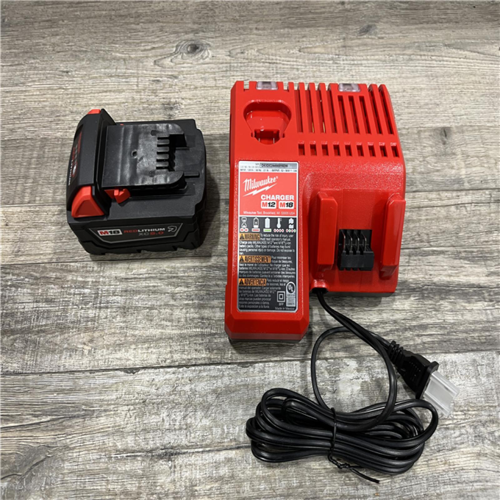 AS-IS Milwaukee 18-Volt Lithium-Ion XC Starter Kit with One 5.0Ah Battery and Charger