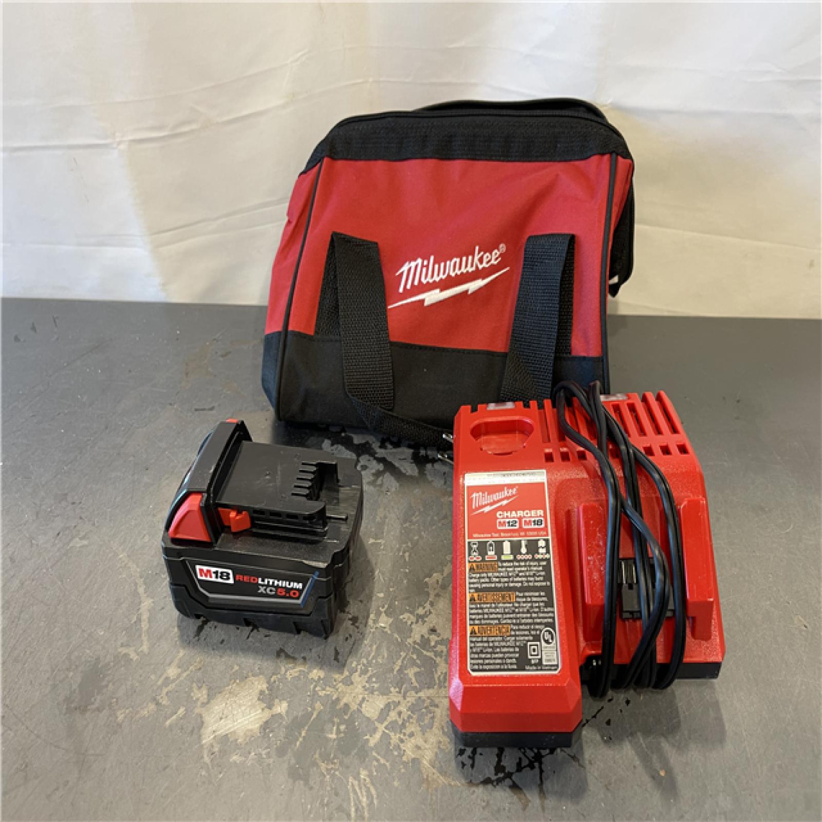 AS-IS - Milwaukee M18 18-Volt Lithium-Ion XC Starter Kit