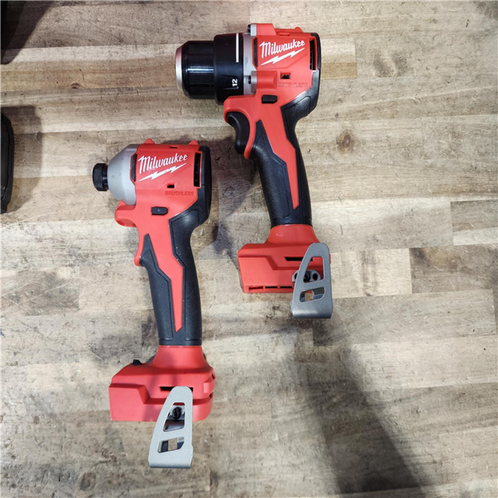 HOUSTON LOCATION - AS-IS Milwaukee M18 18V Lithium-Ion Brushless Cordless Compact Drill/Impact Combo Kit (2-Tool) W/(2) 2.0 Ah Batteries  Charger & Bag
