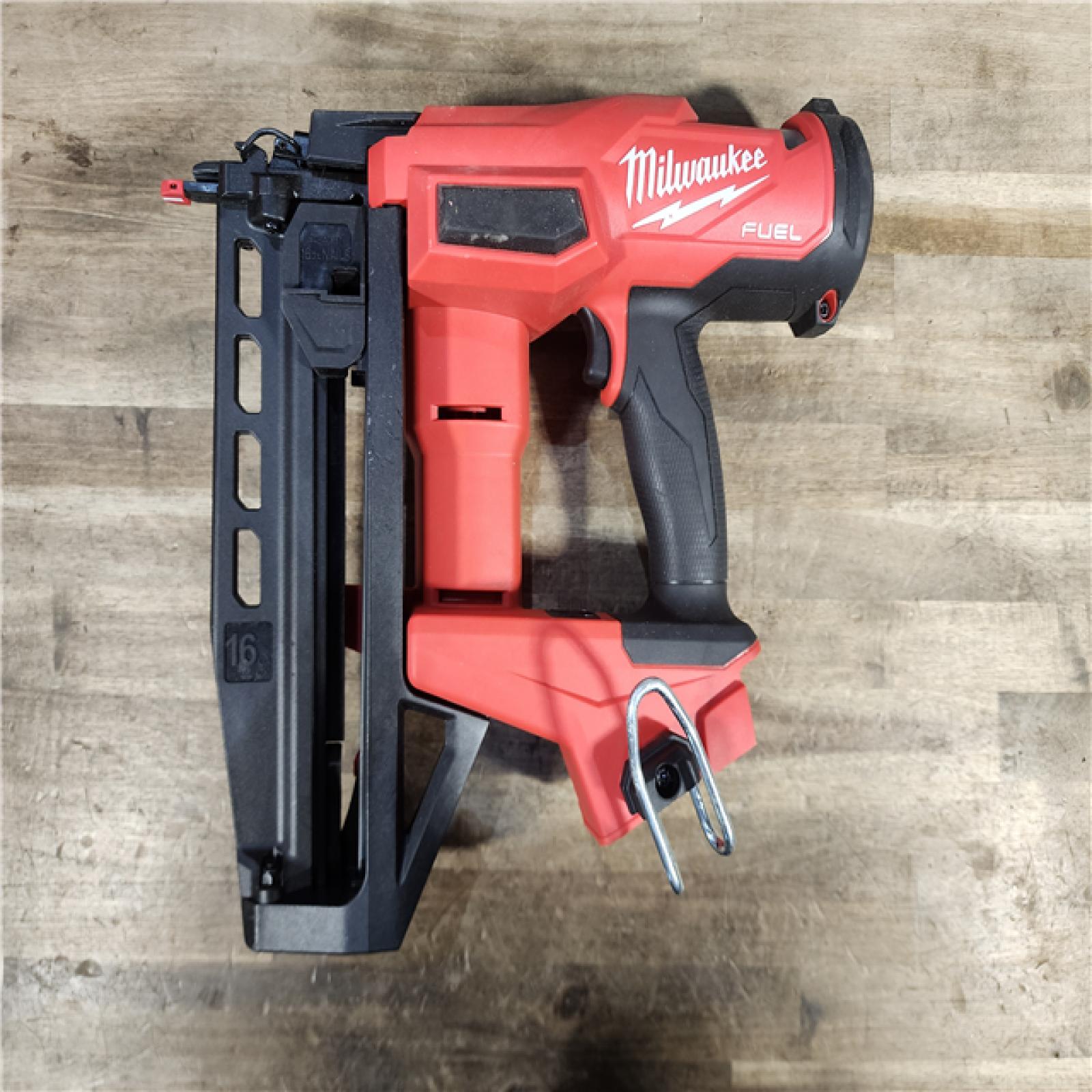 HOUSTON LOCATION - AS-IS Milwaukee Tool Cordless Finish Nail Gun 18 V 3020-20 (TOOL ONLY)