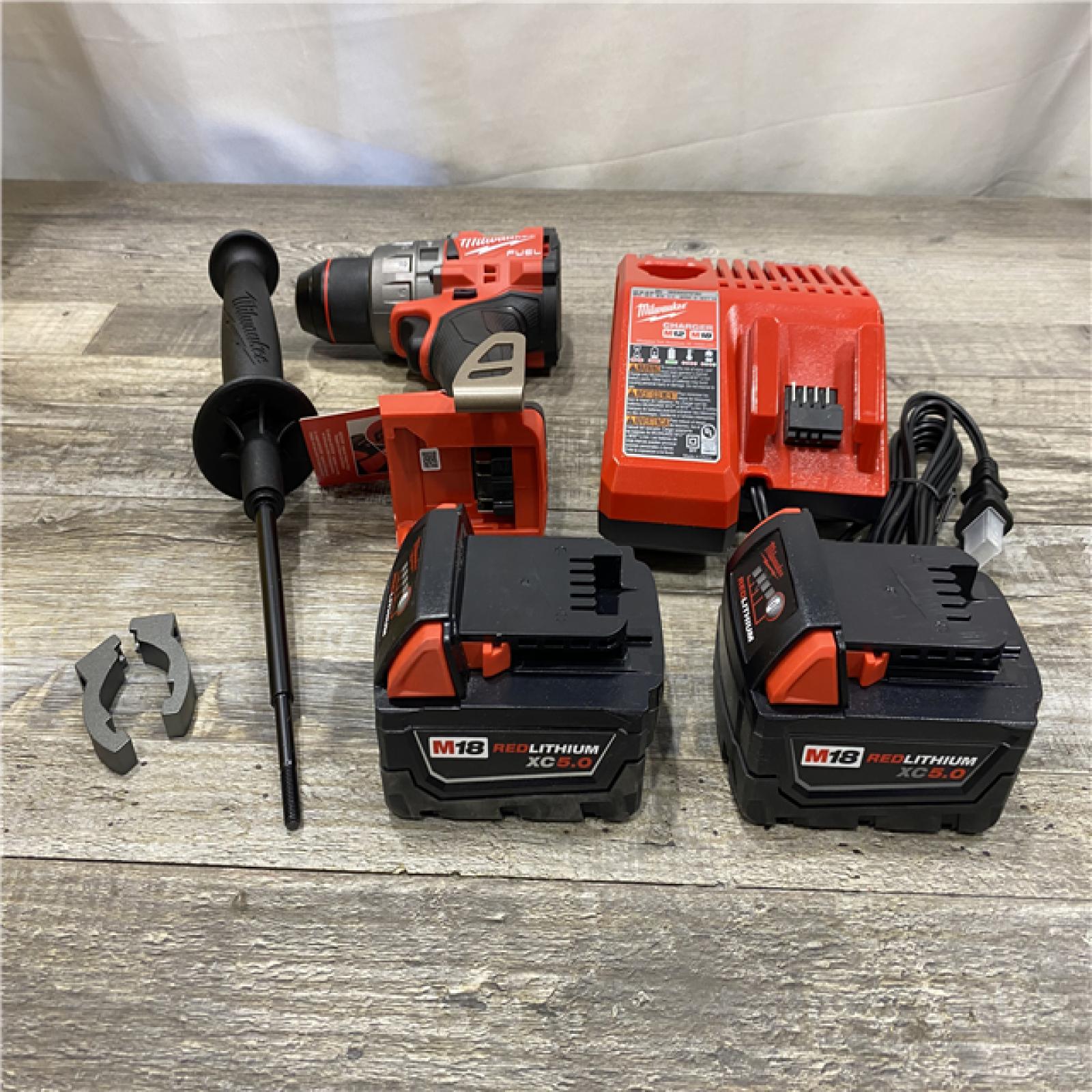 AS-IS Milwaukee FUEL 18V Lithium-Ion Brushless Cordless 1/2 in. Hammer Drill Driver Kit