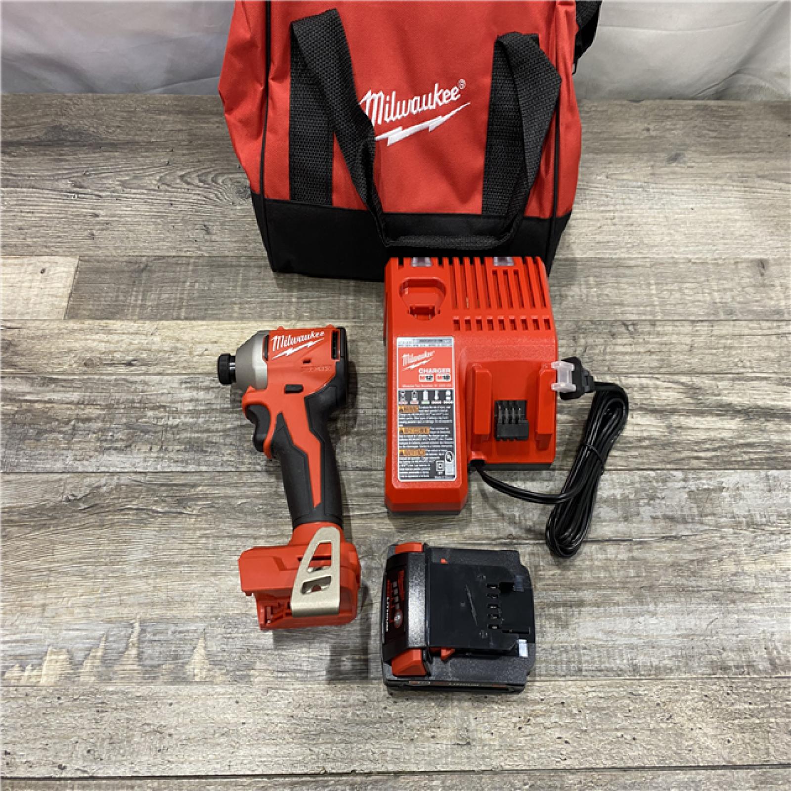 AS-IS Milwaukee 18-Volt Lithium-Ion Compact Brushless Cordless 1/4 in. Impact Driver Kit