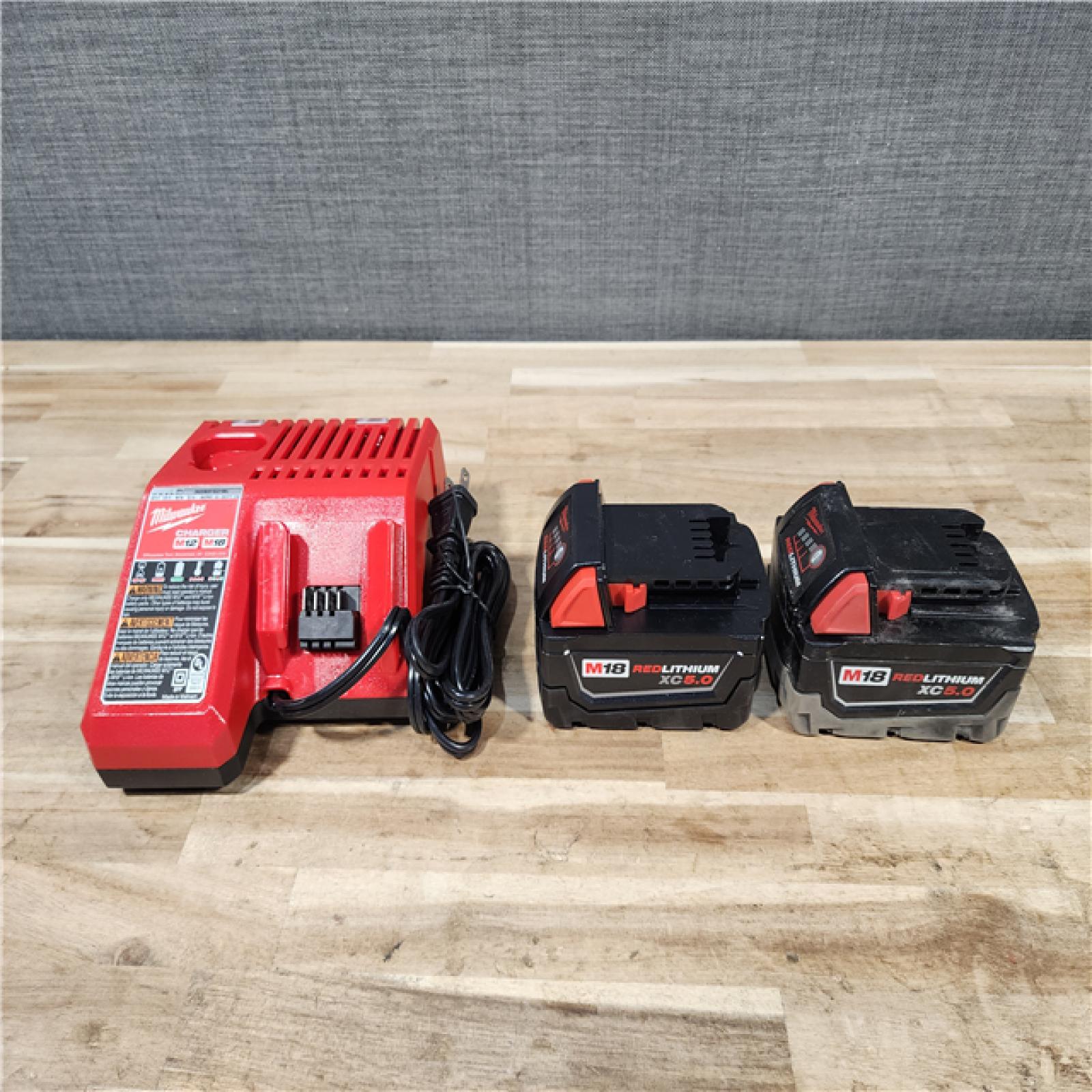 HOUSTON LOCATION - AS-IS MILWAUKEE 2 TOOL COMBO KIT W/ (2) BATTERY & CHARGER