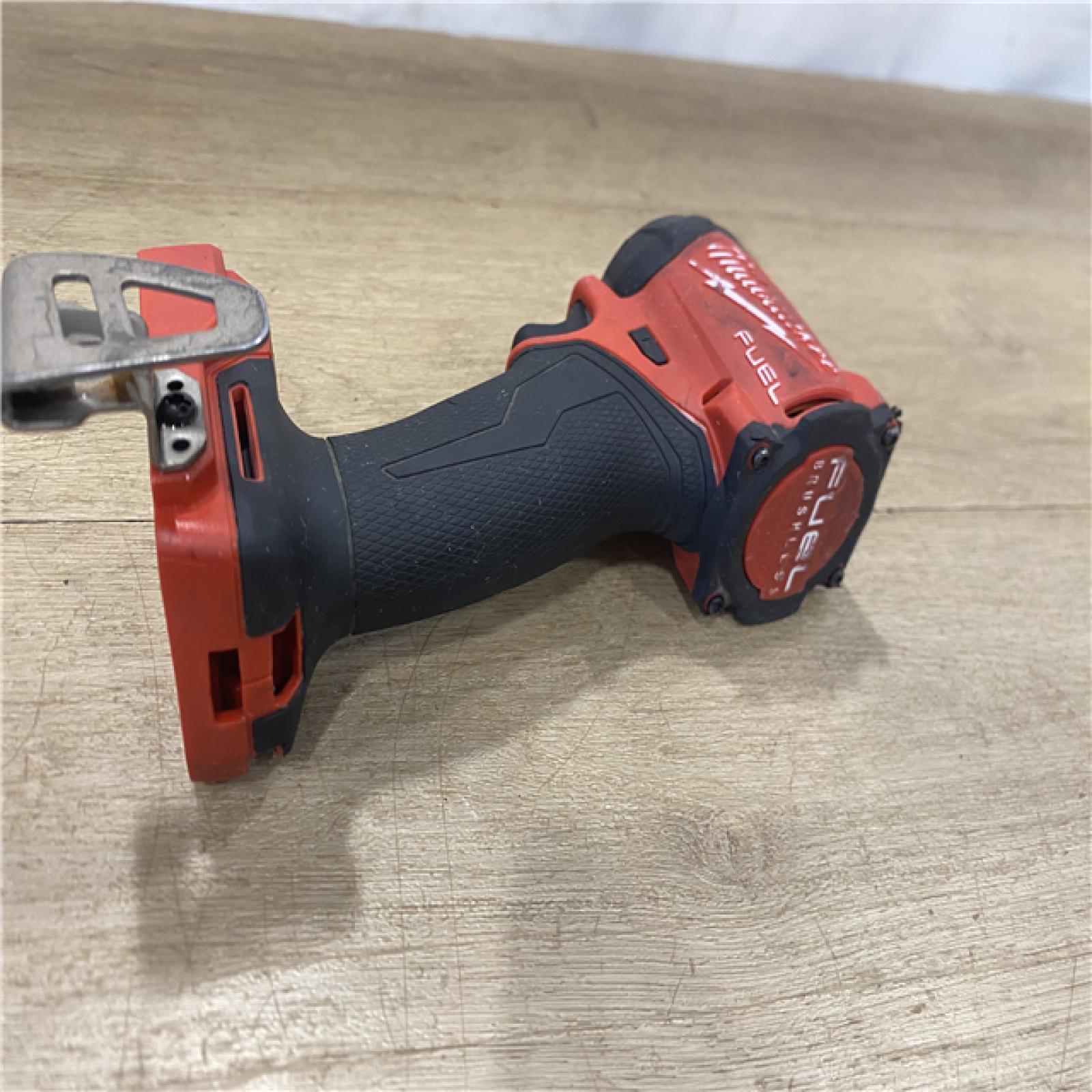 AS-IS Milwaukee FUEL SURGE 18V Lithium-Ion Brushless Cordless 1/4 in. Hex Impact Driver (Tool-Only)
