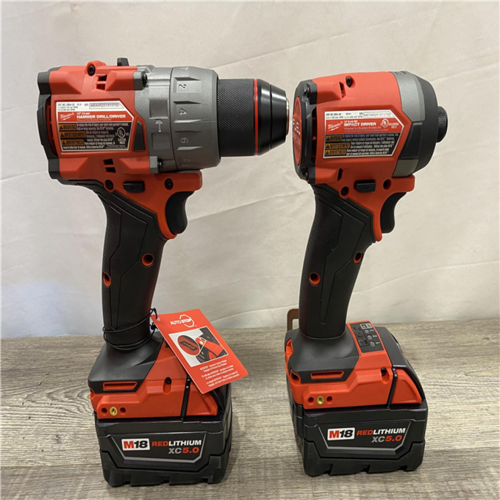 AS-IS Milwaukee FUEL 18V Lithium-Ion Brushless Cordless Hammer Drill and Impact Driver Combo Kit