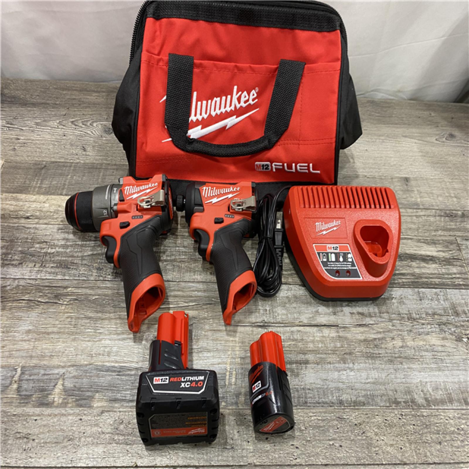 AS-IS Milwaukee FUEL 12-Volt Lithium-Ion Brushless Cordless Hammer Drill and Impact Driver Combo Kit