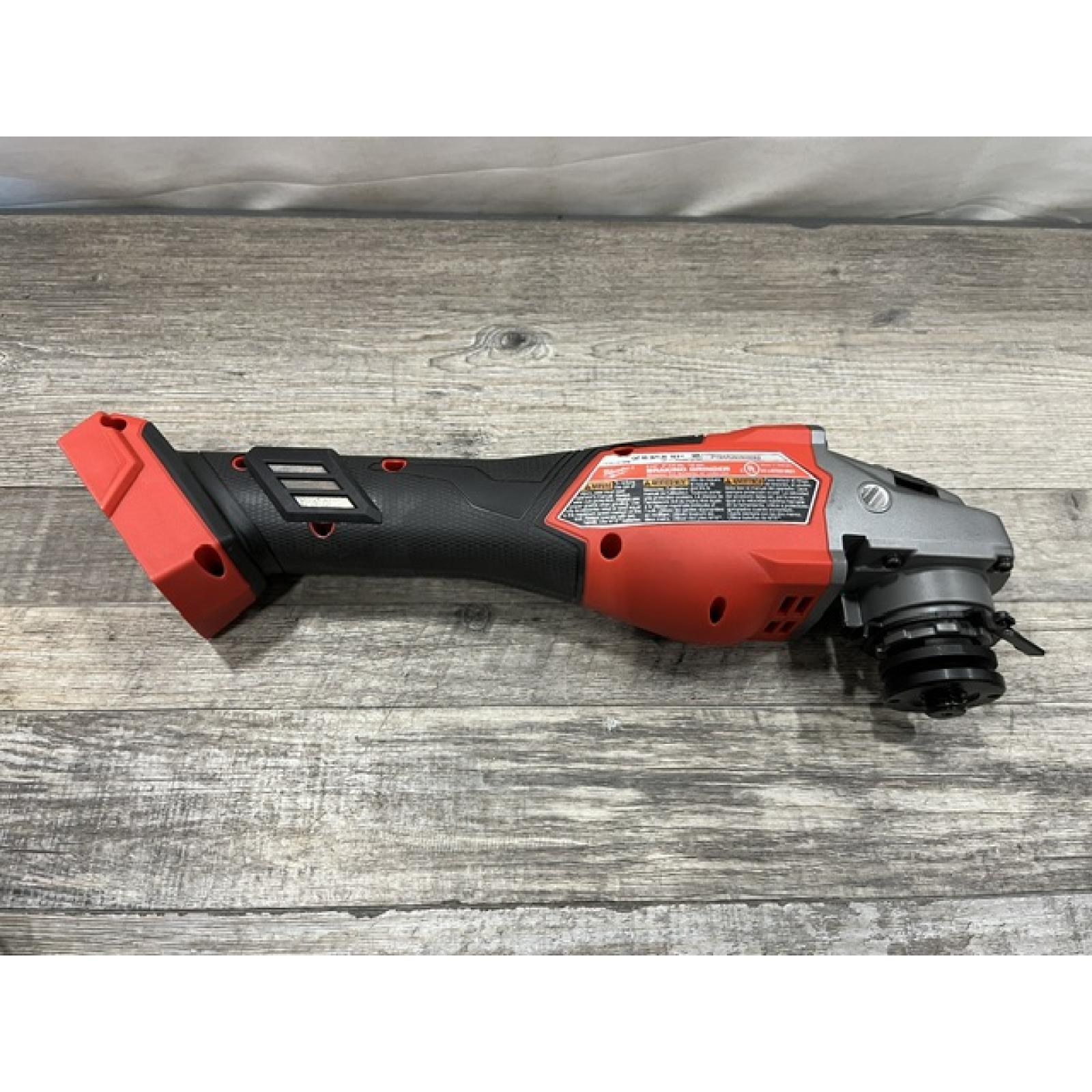 AS-IS Milwaukee FUEL 18V Lithium-Ion Brushless Cordless 4-1/2 in./6 in. Braking Grinder with Slide Switch (Tool-Only)