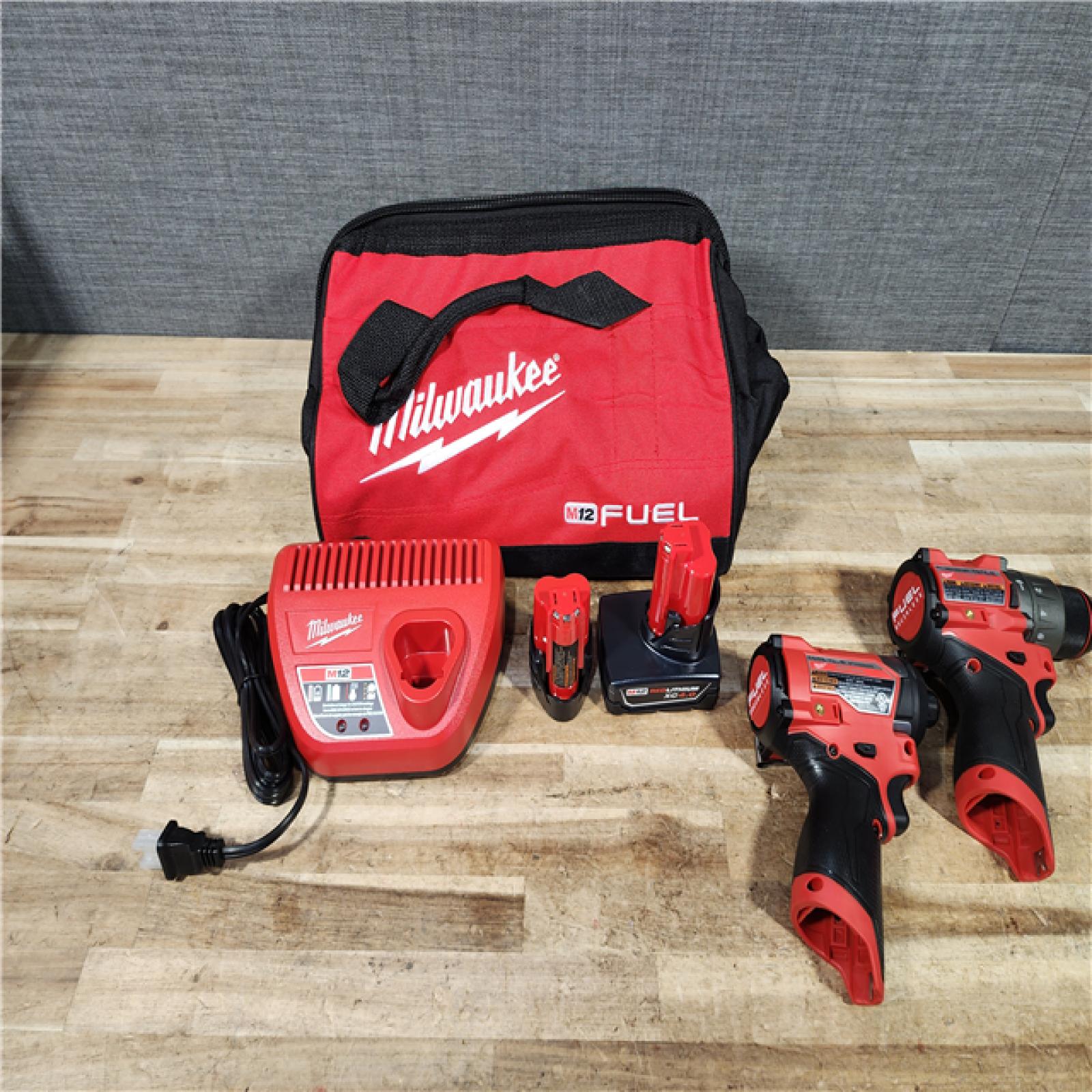 HOUSTON LOCATION - AS - IS Milwaukee FUEL 12-Volt Lithium-Ion Brushless Cordless Hammer Drill and Impact Driver Combo Kit