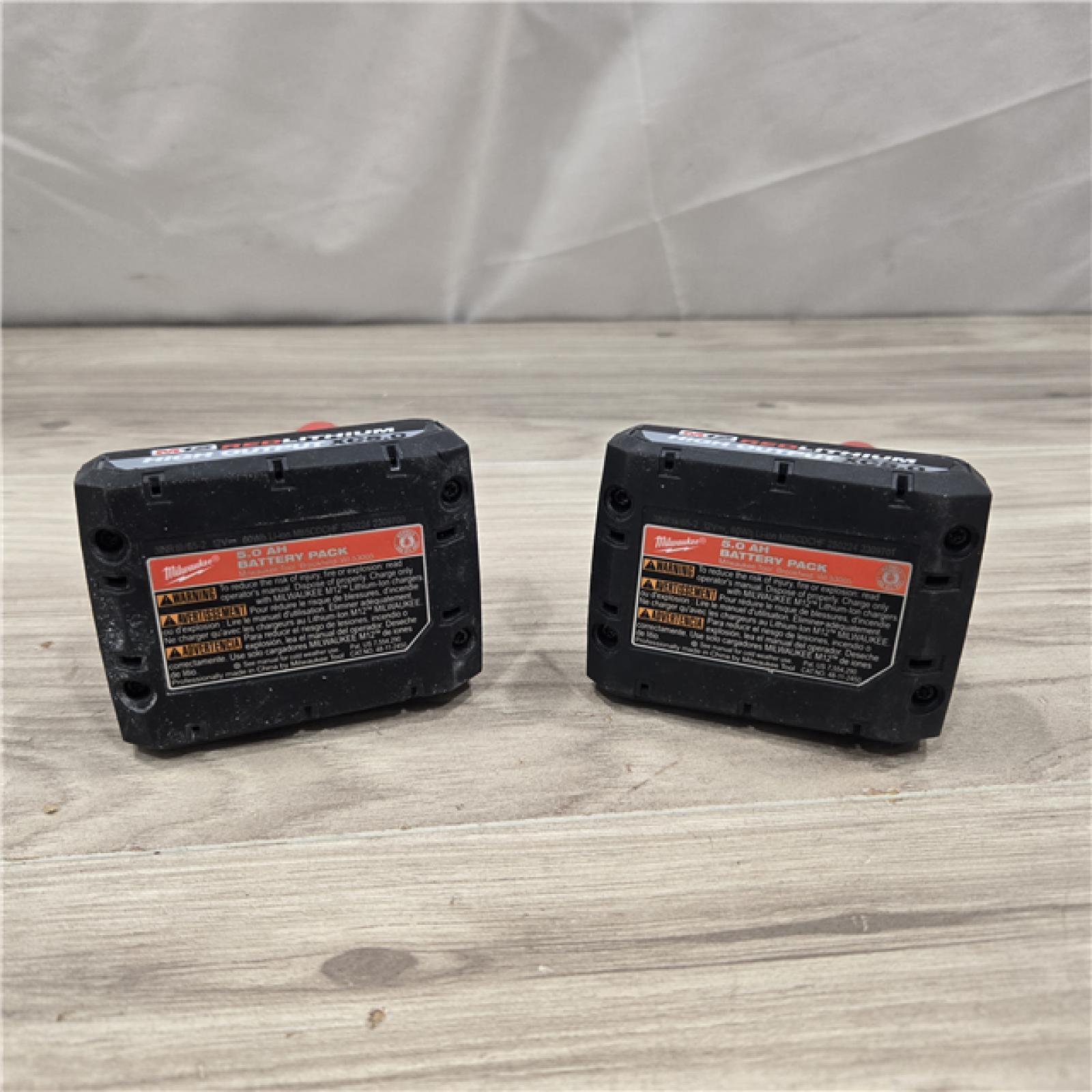 AS-IS Milwaukee M12 12V Lithium-Ion XC High Output 5.0 Ah Battery Pack (2-Pack) Starter Kit