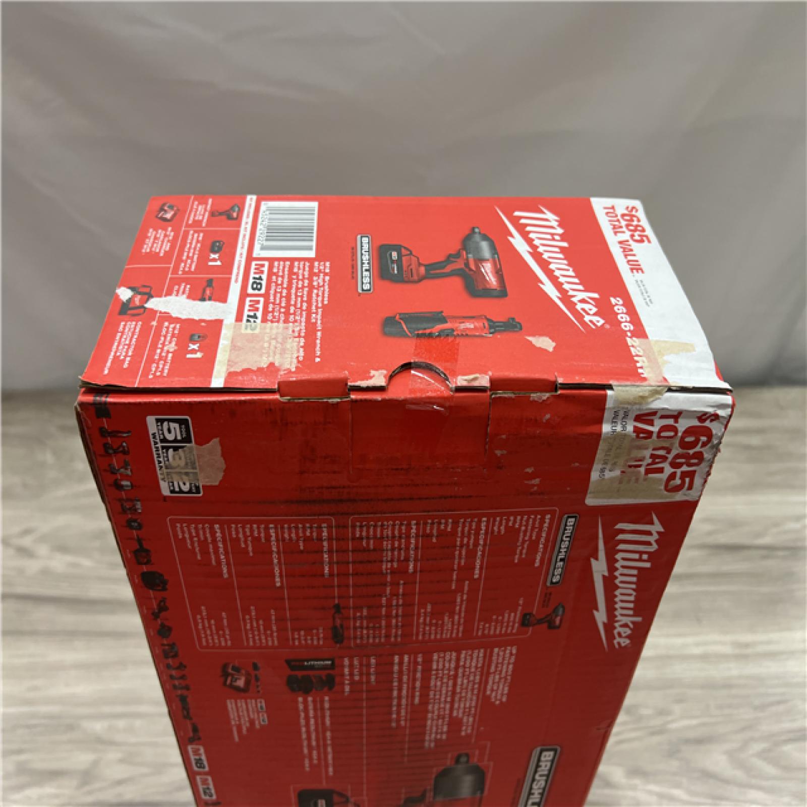 NEW Milwaukee 12/18V Lithium-Ion Cordless 3/8 in. Ratchet and 1/2 in. High Torque Impact Wrench with Friction Ring Combo Kit