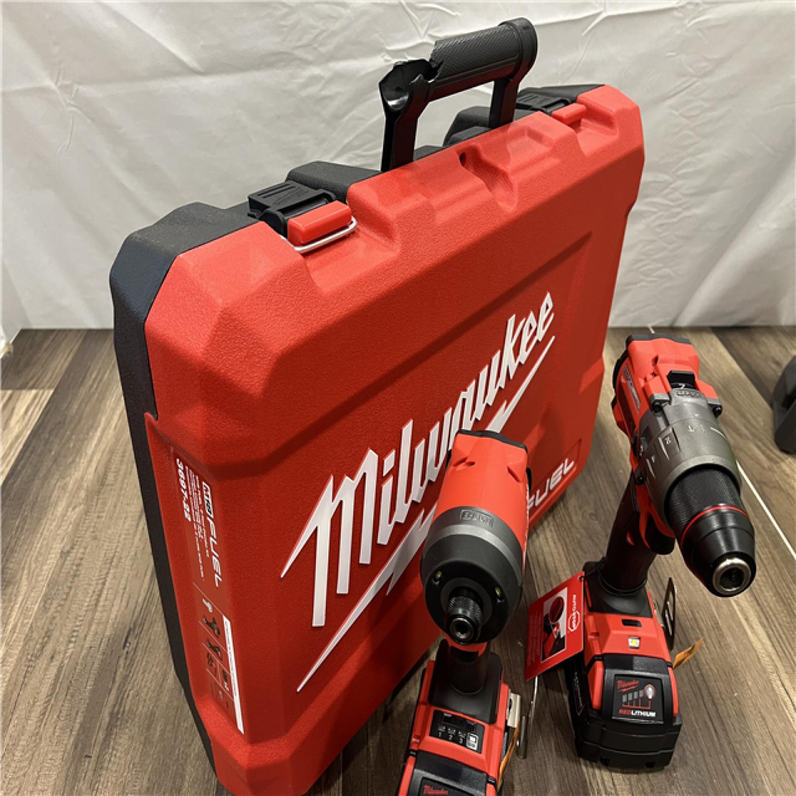 Like New! - MILWAUKEE FUEL 18V Lithium-Ion Brushless Cordless Hammer Drill and Impact Driver Combo Kit