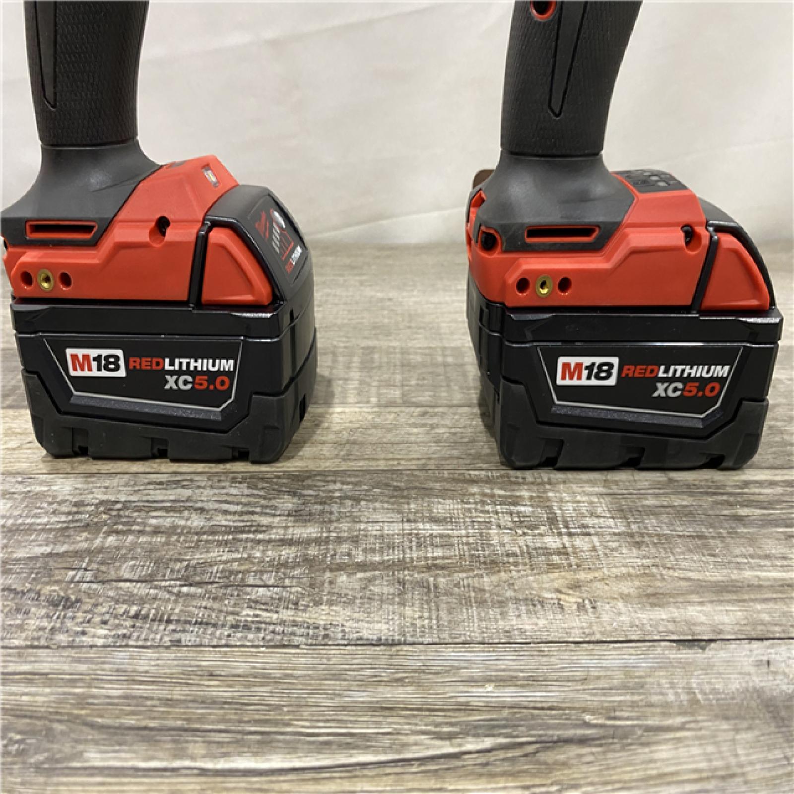 AS-IS Milwaukee FUEL 18V Lithium-Ion Brushless Cordless Hammer Drill and Impact Driver Combo Kit