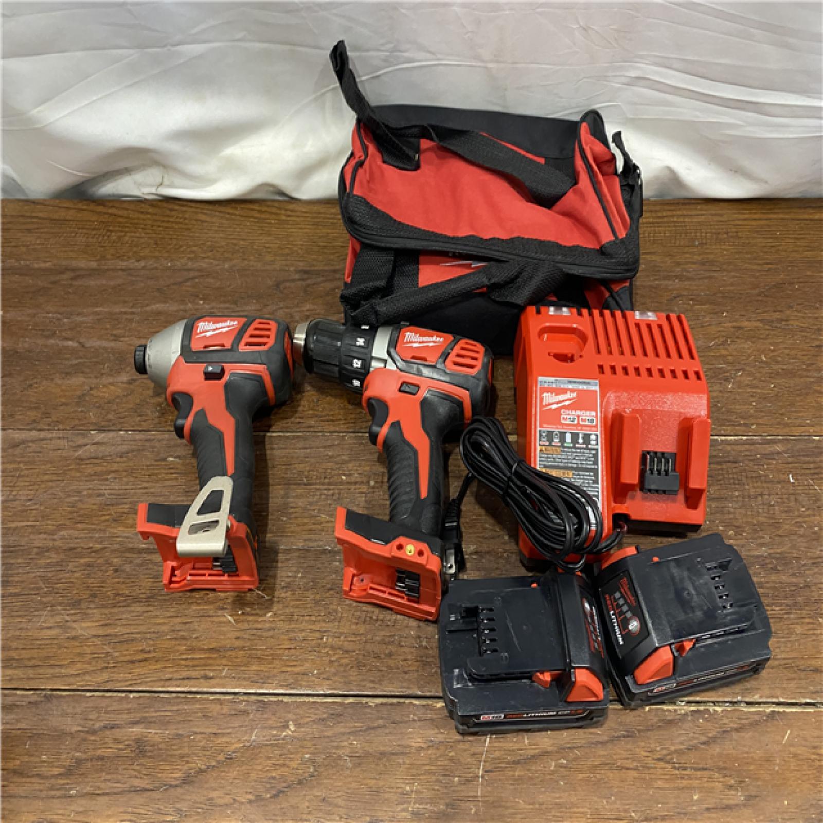 AS-IS Milwaukee M18 18V Cordless Brushed 2 Tool Drill/Driver and Impact Driver Kit