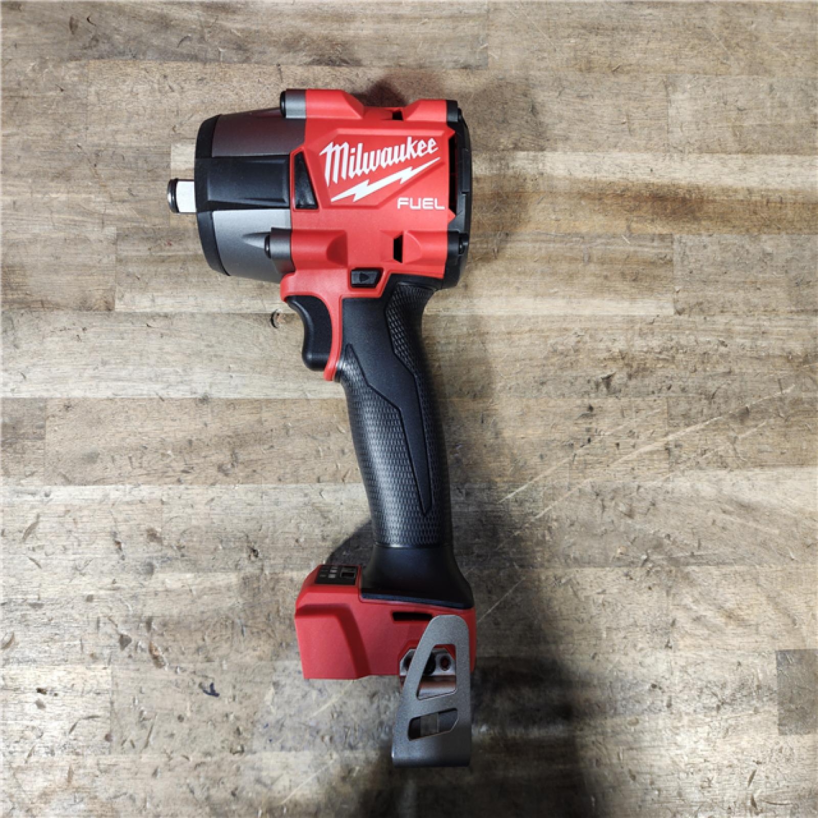 HOUSTON LOCATION - AS-IS (APPEARS LIKE NEW) Milwaukee 2962-20 M18 18V Fuel 1/2 Mid-Torque Impact Wrench Cordless Lithium-Ion Brushless (Tool-Only)