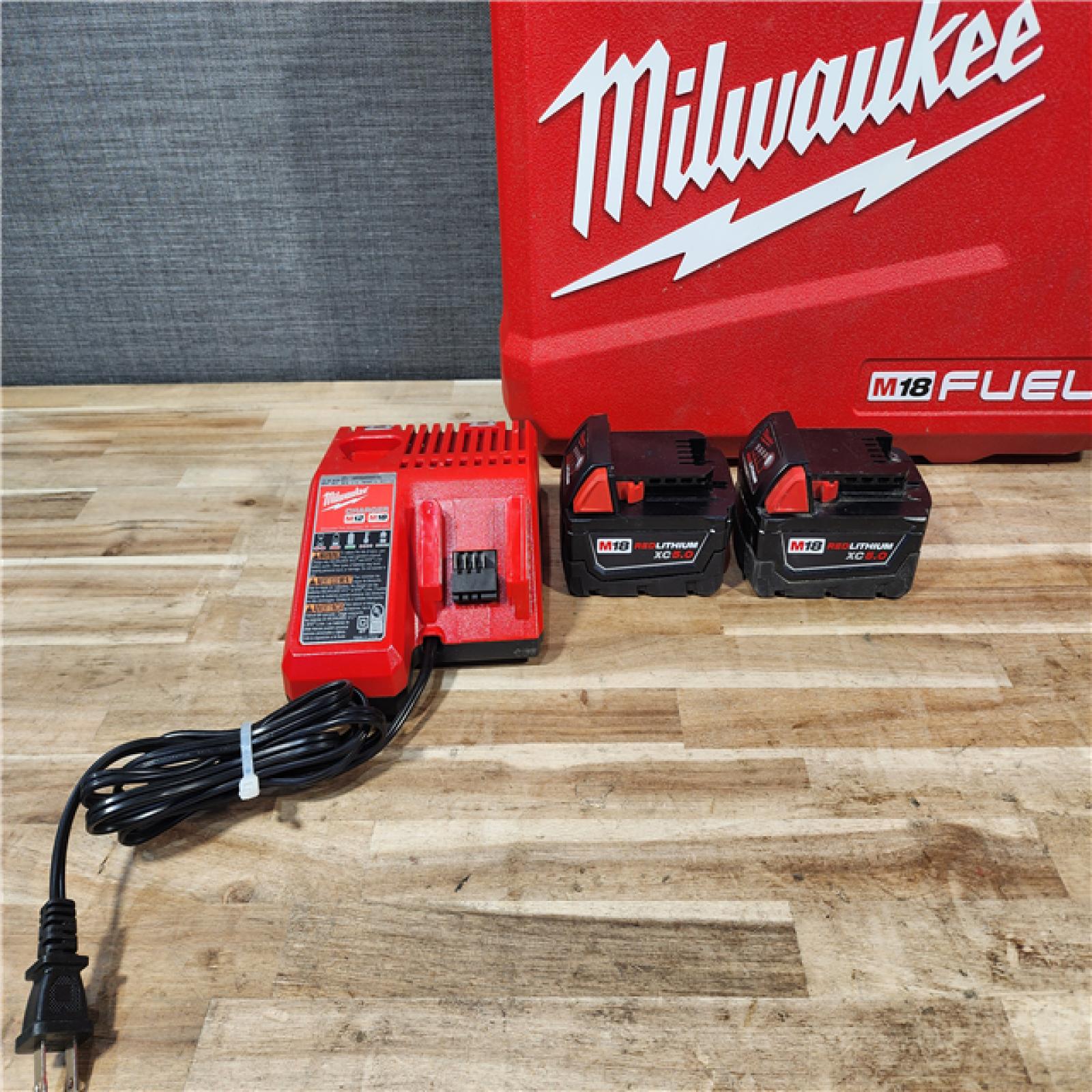 HOUSTON LOCATION - AS-IS Milwaukee  FUEL 18V Lithium-Ion Brushless Cordless Hammer Drill and Impact Driver Combo Kit