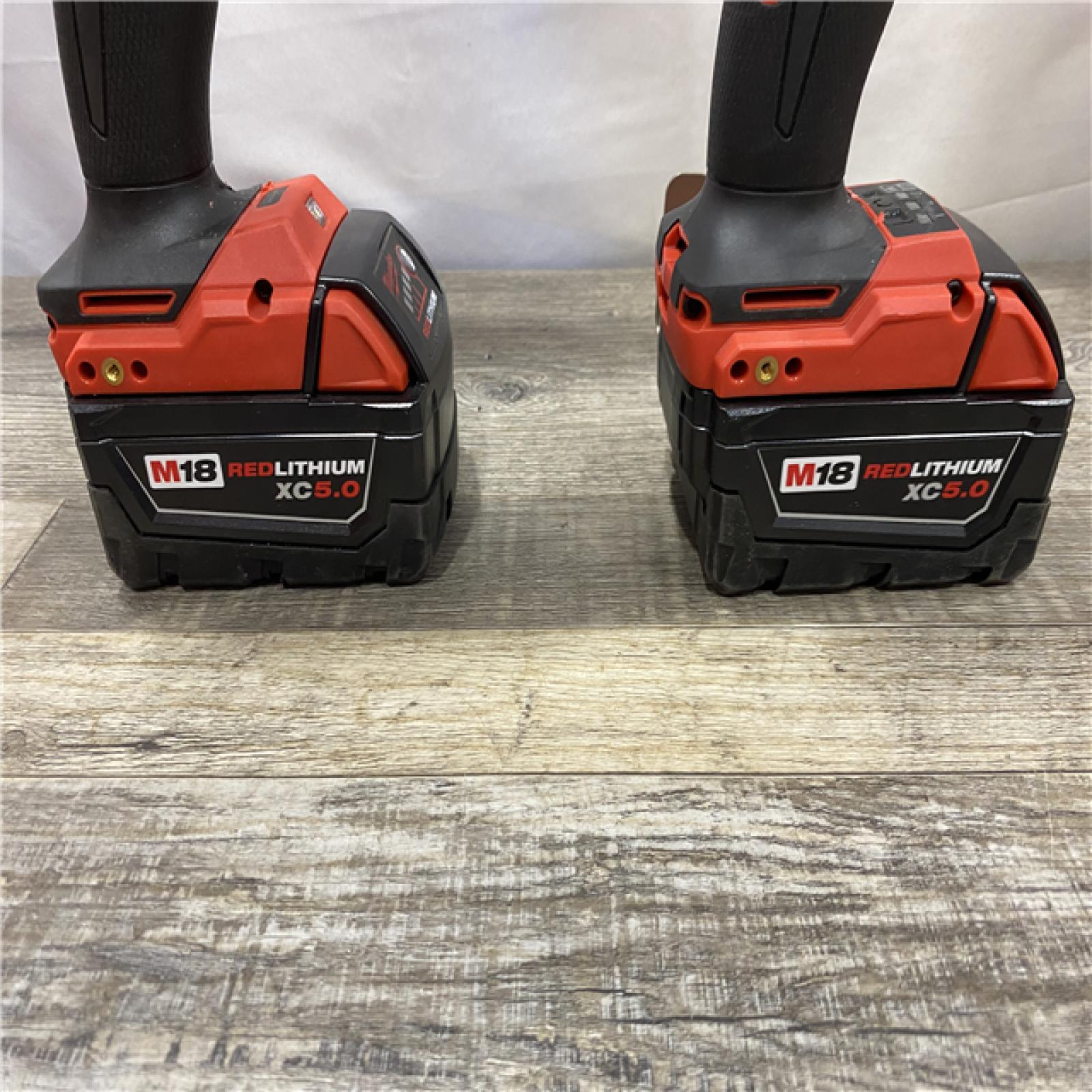 AS-IS Milwaukee FUEL 18V Lithium-Ion Brushless Cordless Hammer Drill and Impact Driver Combo Kit