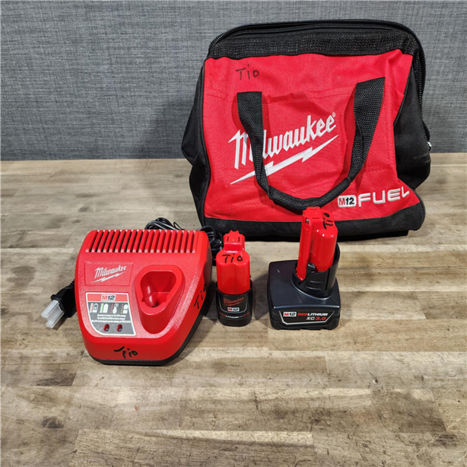 HOUSTON LOCATION - AS-IS Milwaukee 3497-22 12V Brushless Hammer Drill and Impact Driver Combo Kit
