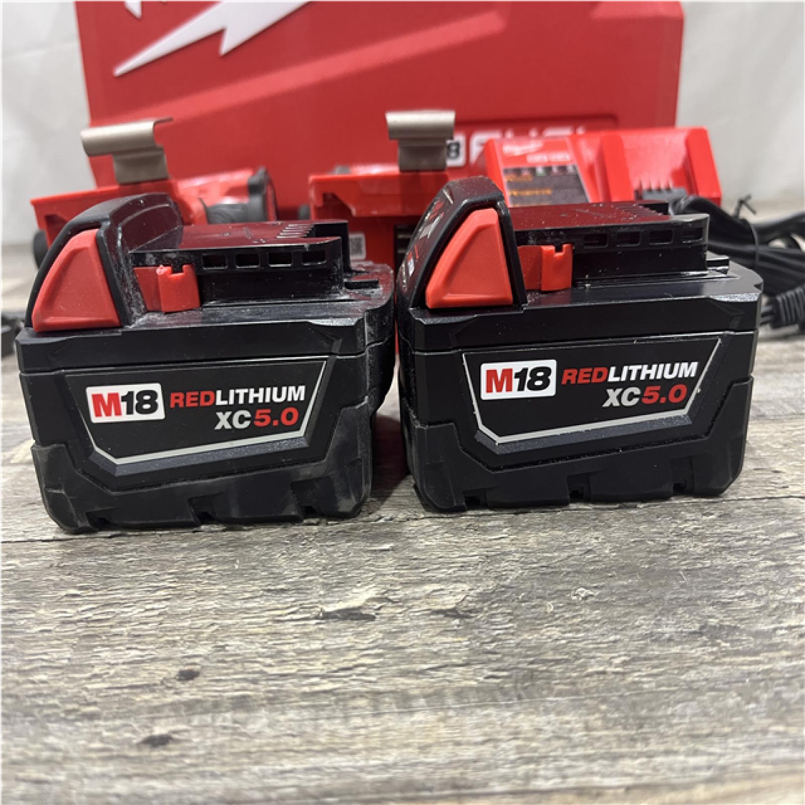 AS-IS Milwaukee FUEL 18V Lithium-Ion Brushless Cordless Hammer Drill and Impact Driver Combo Kit
