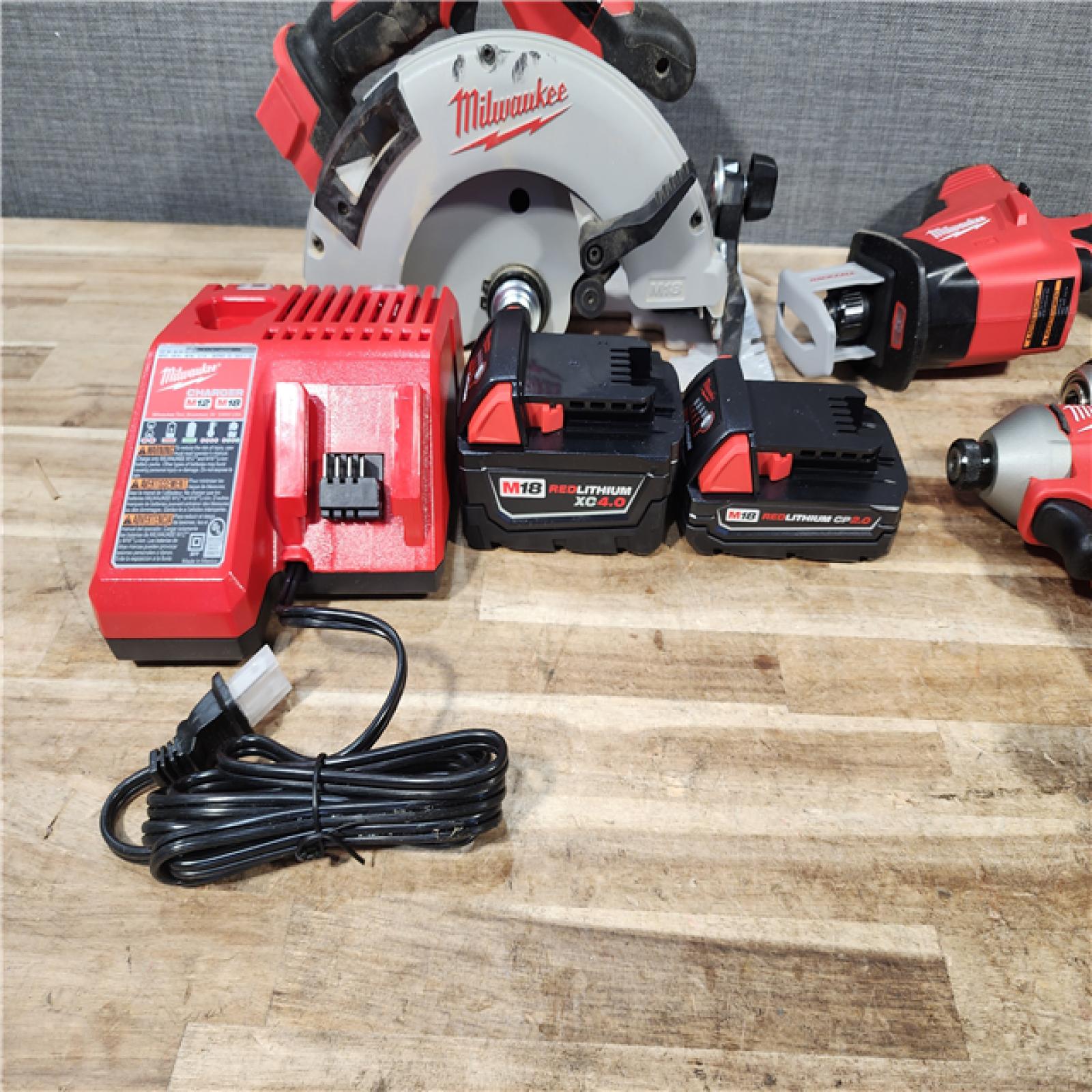 HOUSTON LOCATION - AS - IS Milwaukee 18-Volt Lithium-Ion Brushless Cordless (4-Tool) Combo Kit