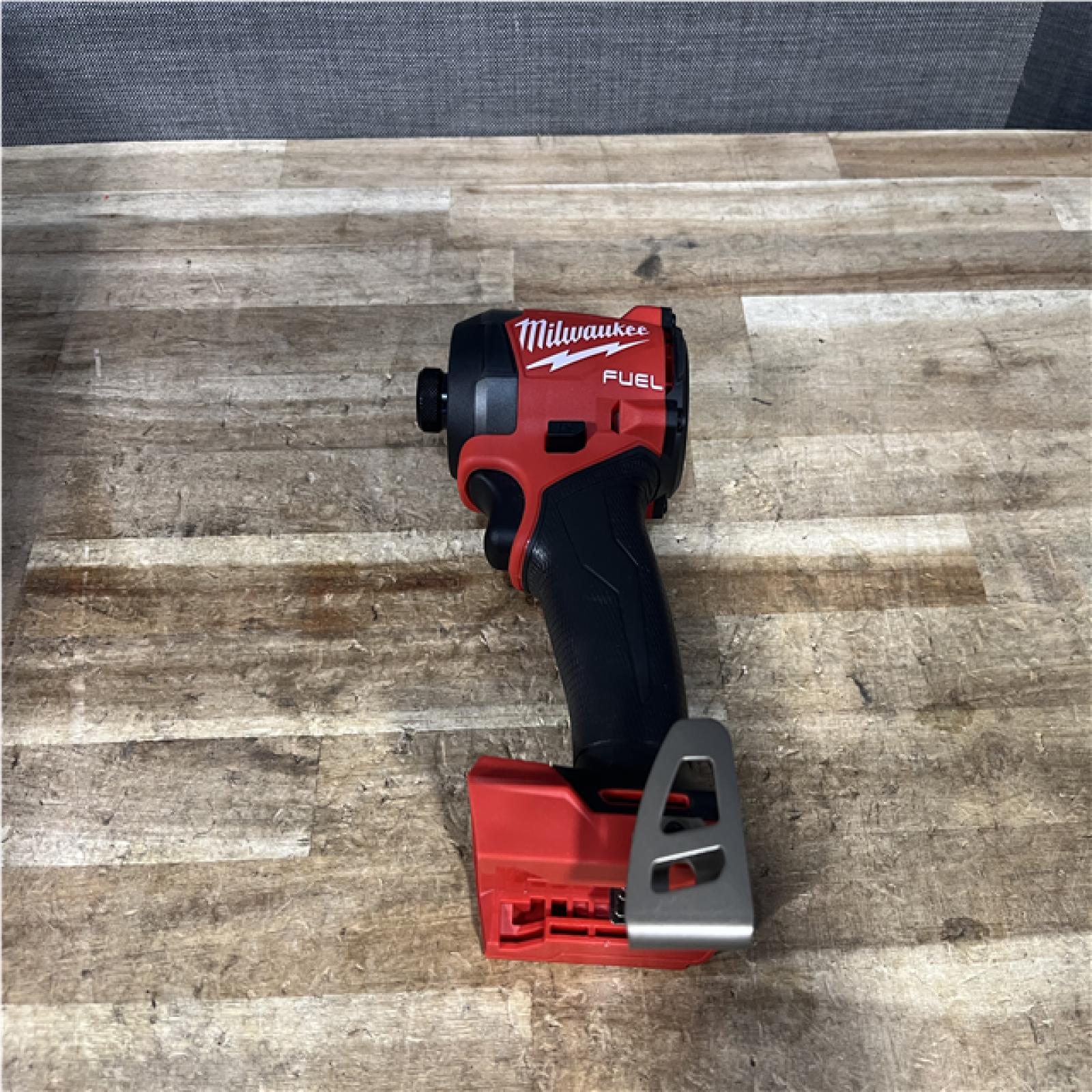 Houston Location AS-IS Milwaukee FUEL 18V Lithium-Ion Brushless Cordless 1/4 in. Hex Impact Driver (Tool-Only)