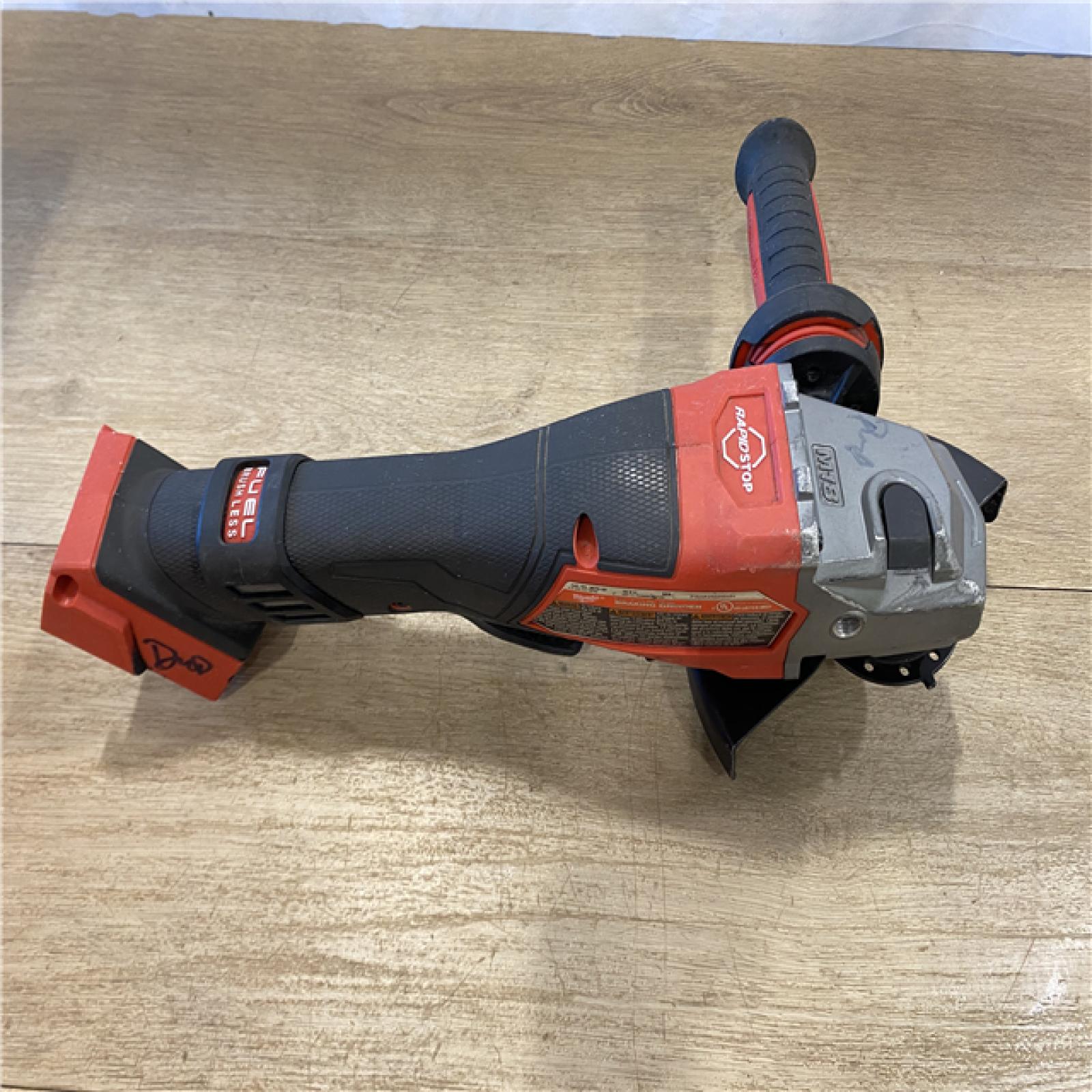 AS-IS Milwaukee FUEL 18-Volt Lithium-Ion Brushless Cordless 4-1/2 in./6 in. Braking Grinder with Paddle Switch (Tool-Only)