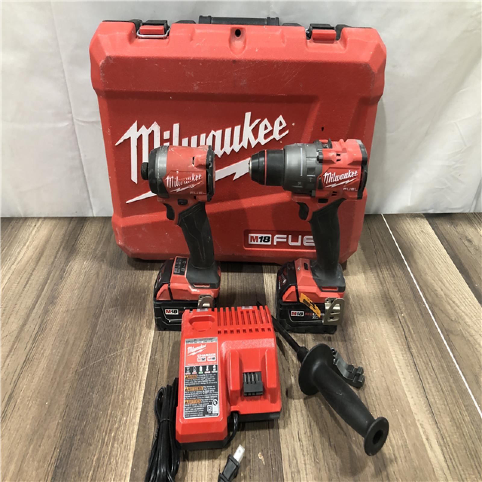 AS-IS Milwaukee FUEL 18V Lithium-Ion Brushless Cordless Hammer Drill and Impact Driver Combo Kit