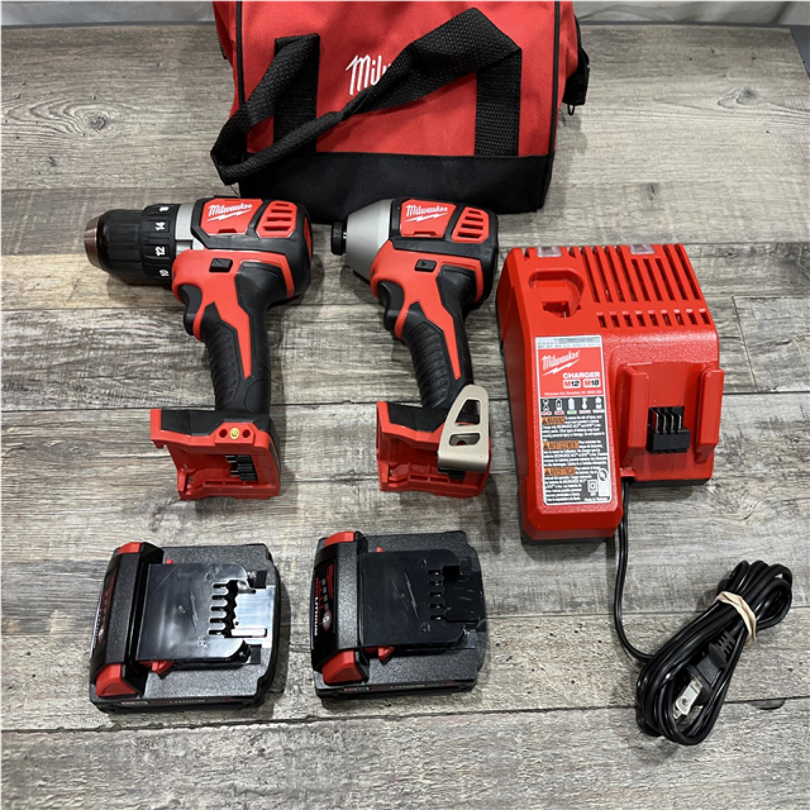 AS-IS Milwaukee 18V Lithium-Ion Cordless Drill Driver/Impact Driver Combo Kit
