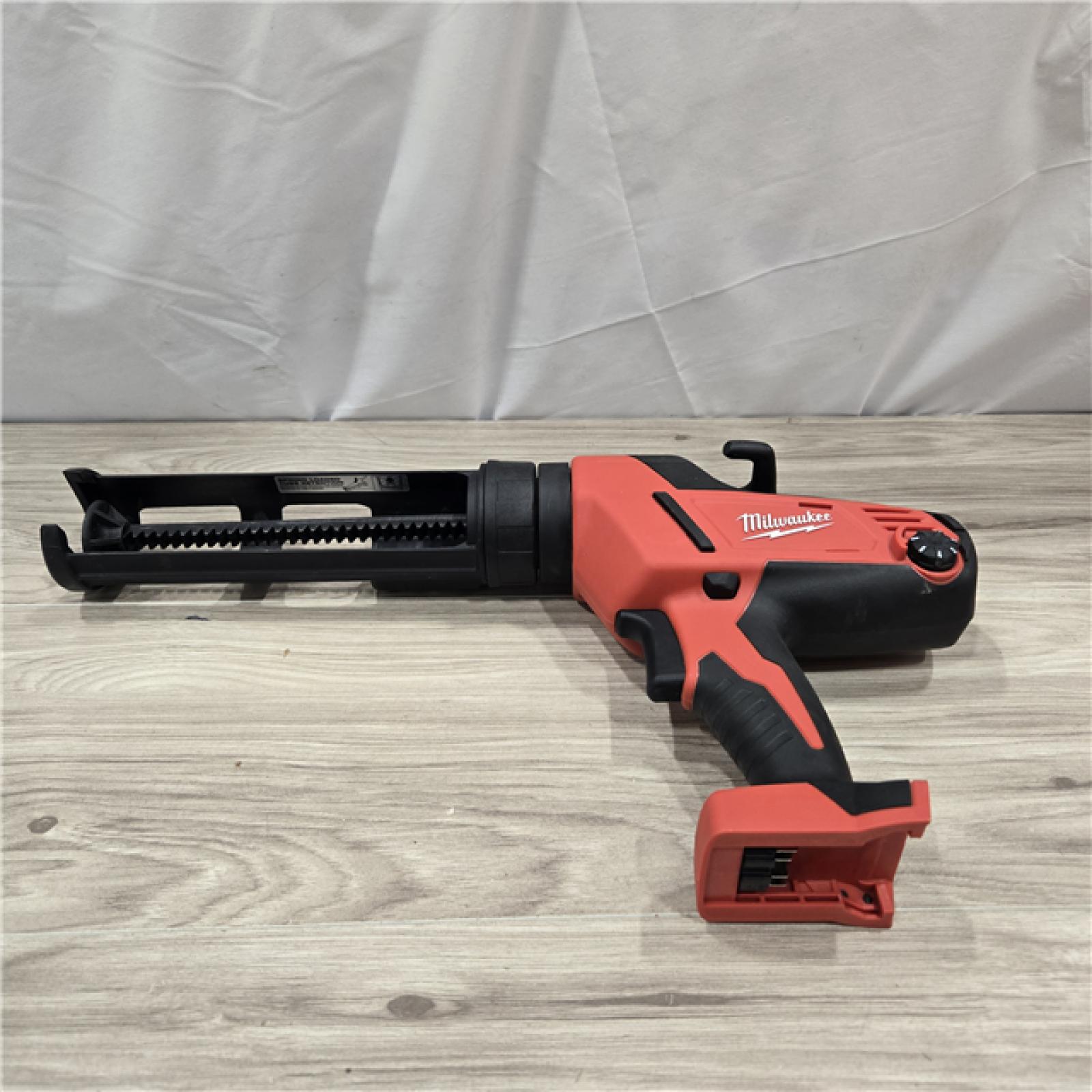 AS-IS Milwaukee M18 18V Cordless 10 oz. Caulk and Adhesive Gun (Tool-Only)