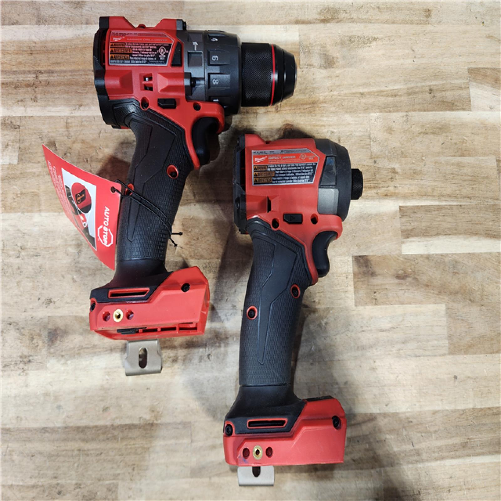 HOUSTON LOCATION - AS-IS Milwaukee FUEL 18V Lithium-Ion Brushless Cordless Hammer Drill and Impact Driver Combo Kit