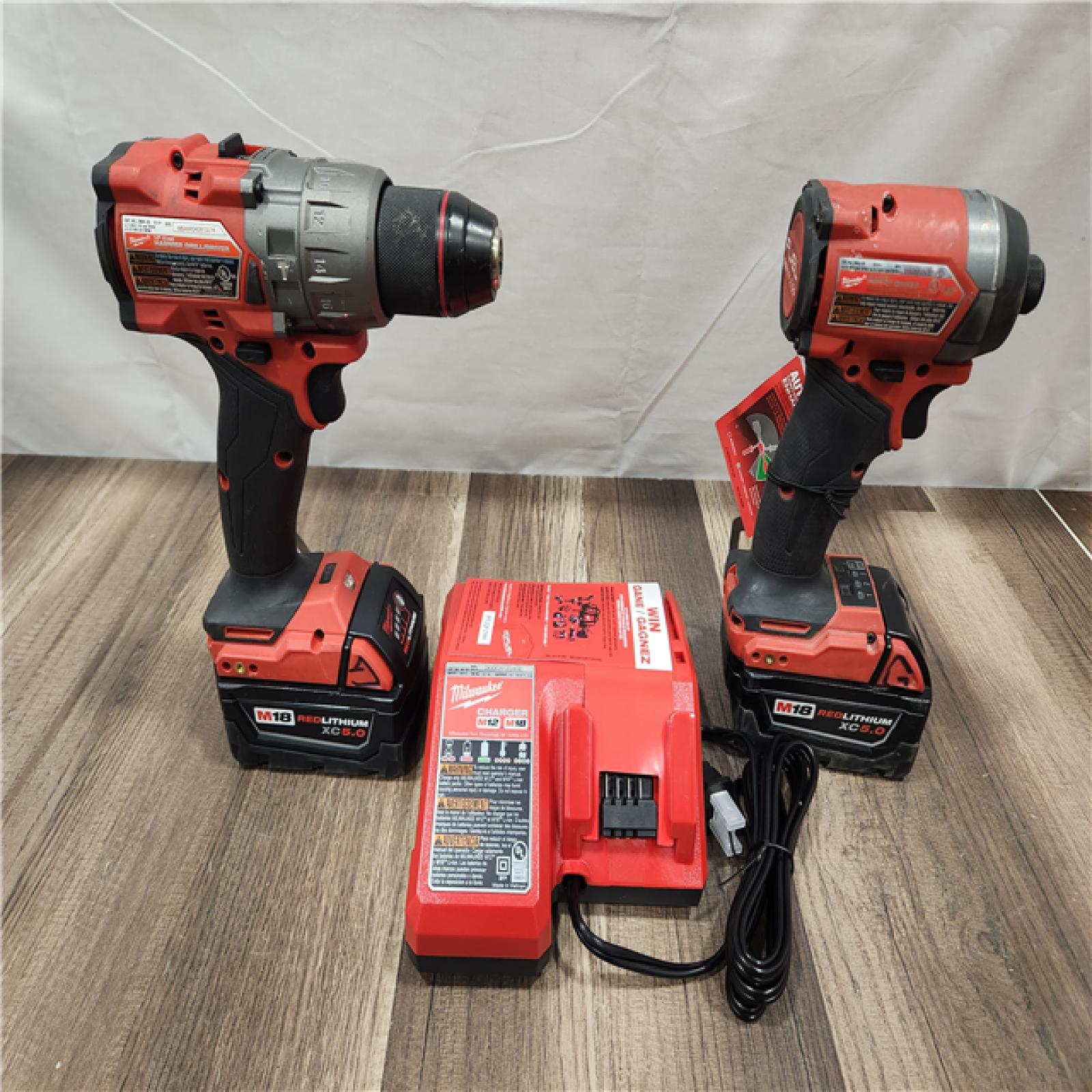 AS-IS- MILWAUKEE FUEL 18V Lithium-Ion Brushless Cordless Hammer Drill and Impact Driver Combo Kit