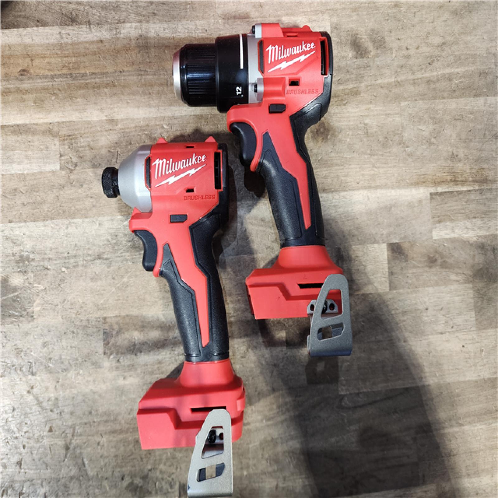 HOUSTON LOCATION - AS-IS Milwaukee M18 18V Lithium-Ion Brushless Cordless Compact Drill/Impact Combo Kit (2-Tool) W/(2) 2.0 Ah Batteries  Charger & Bag