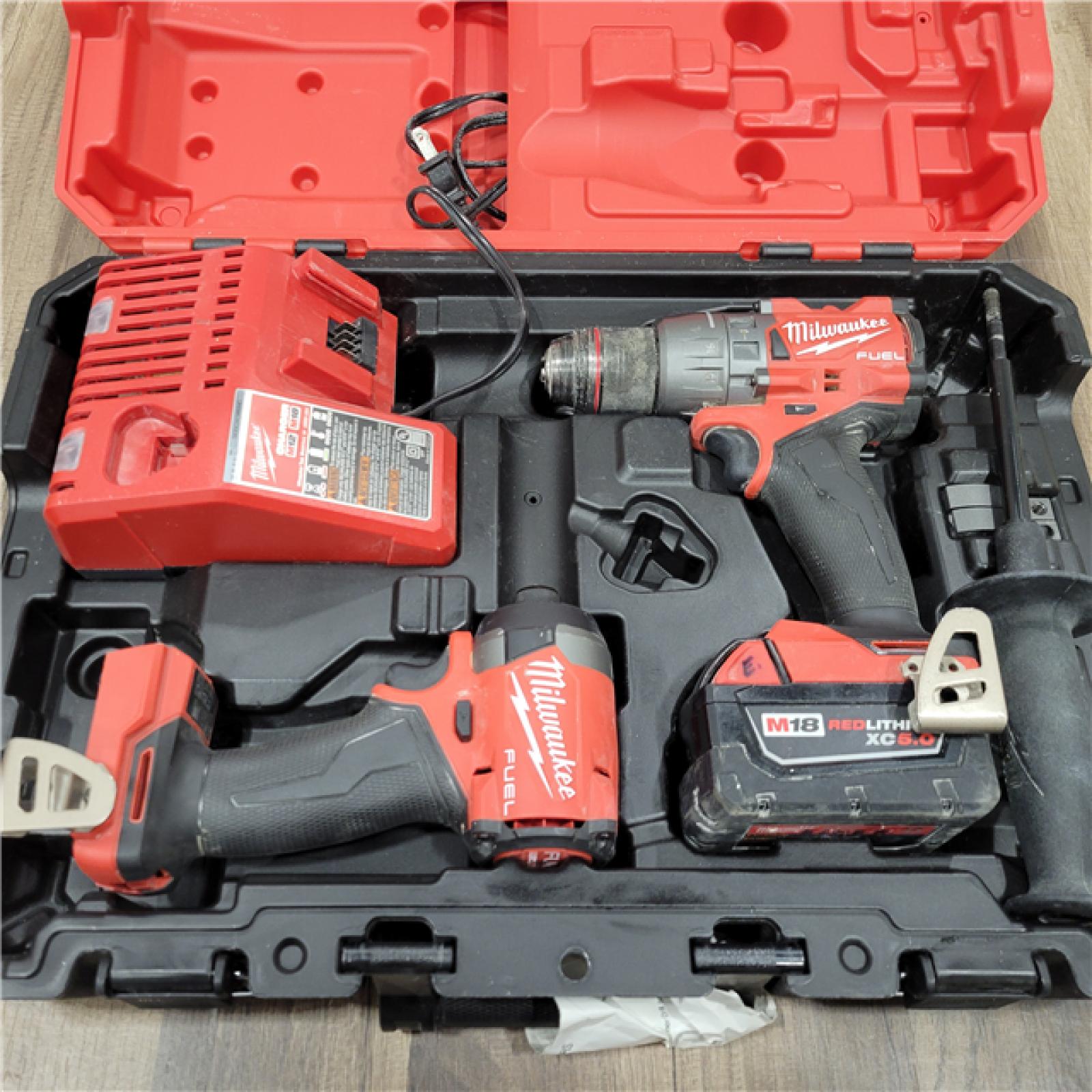 AS-IS Milwaukee M18 FUEL 18V Lithium-Ion Brushless Cordless Hammer Drill and Impact Driver Combo Kit (2-Tool) with 2 Batteries