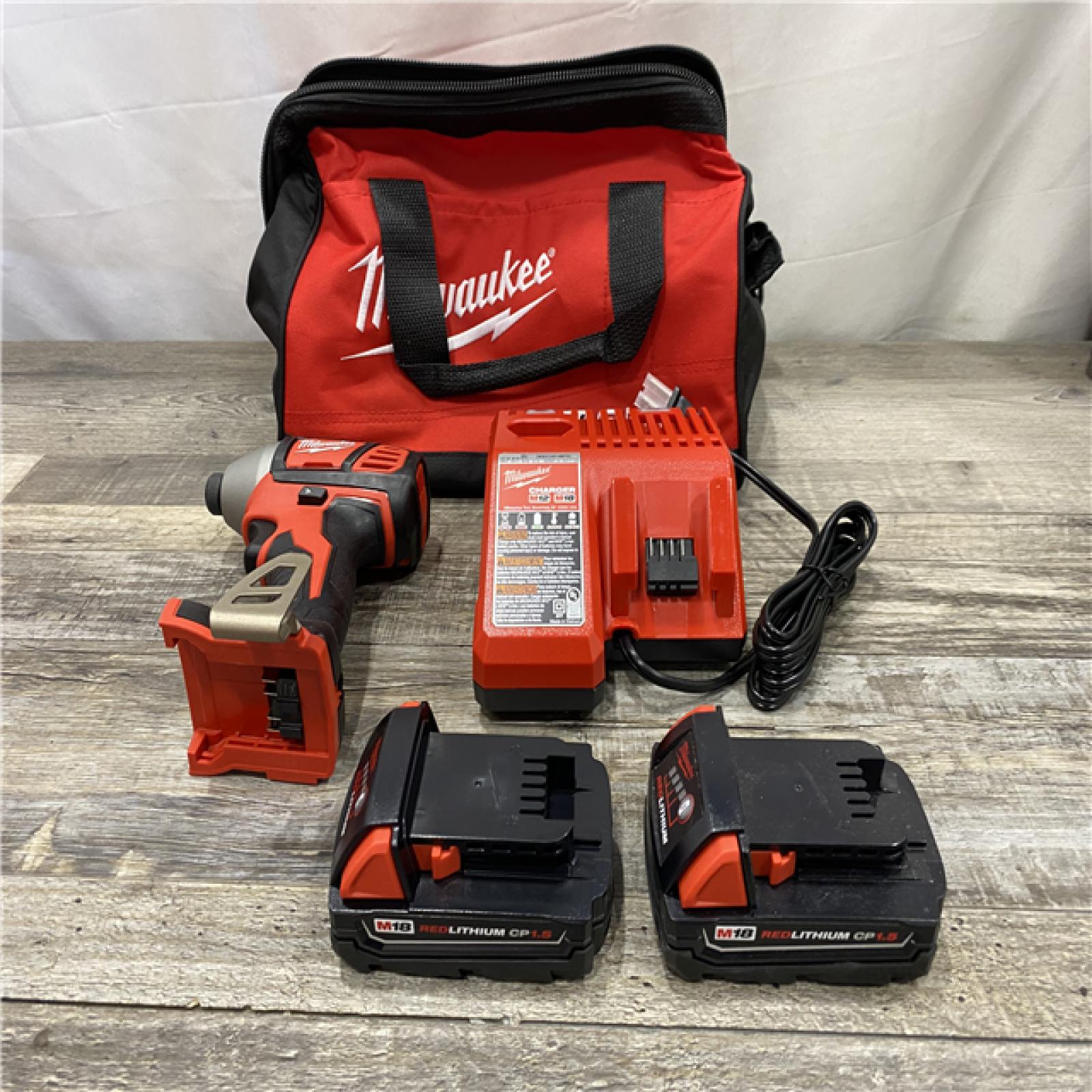 AS-IS Milwaukee 18V Lithium-Ion Cordless 1/4 in. Impact Driver Kit