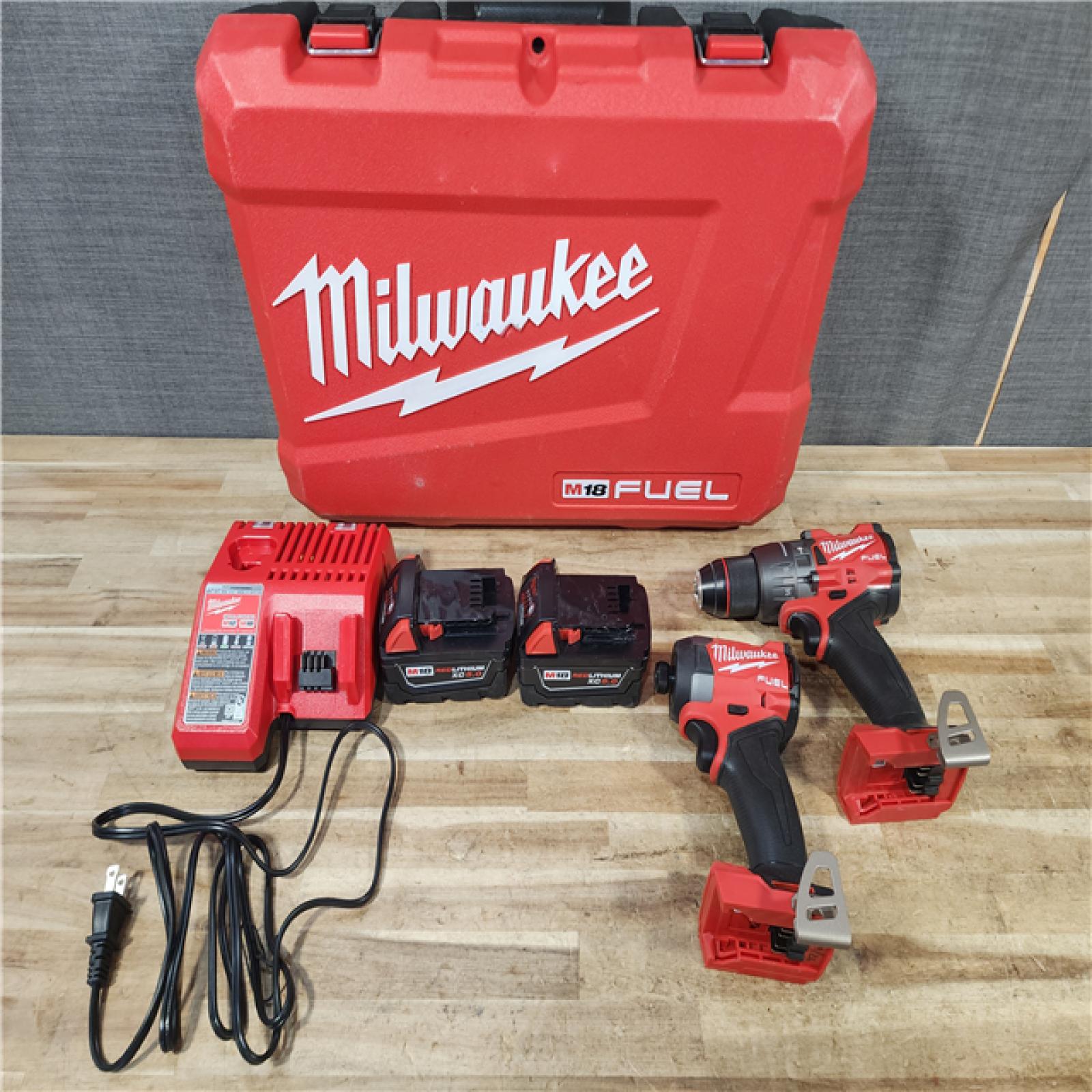 HOUSTON LOCATION - AS - IS Milwaukee FUEL 18V Lithium-Ion Brushless Cordless Hammer Drill and Impact Driver Combo Kit