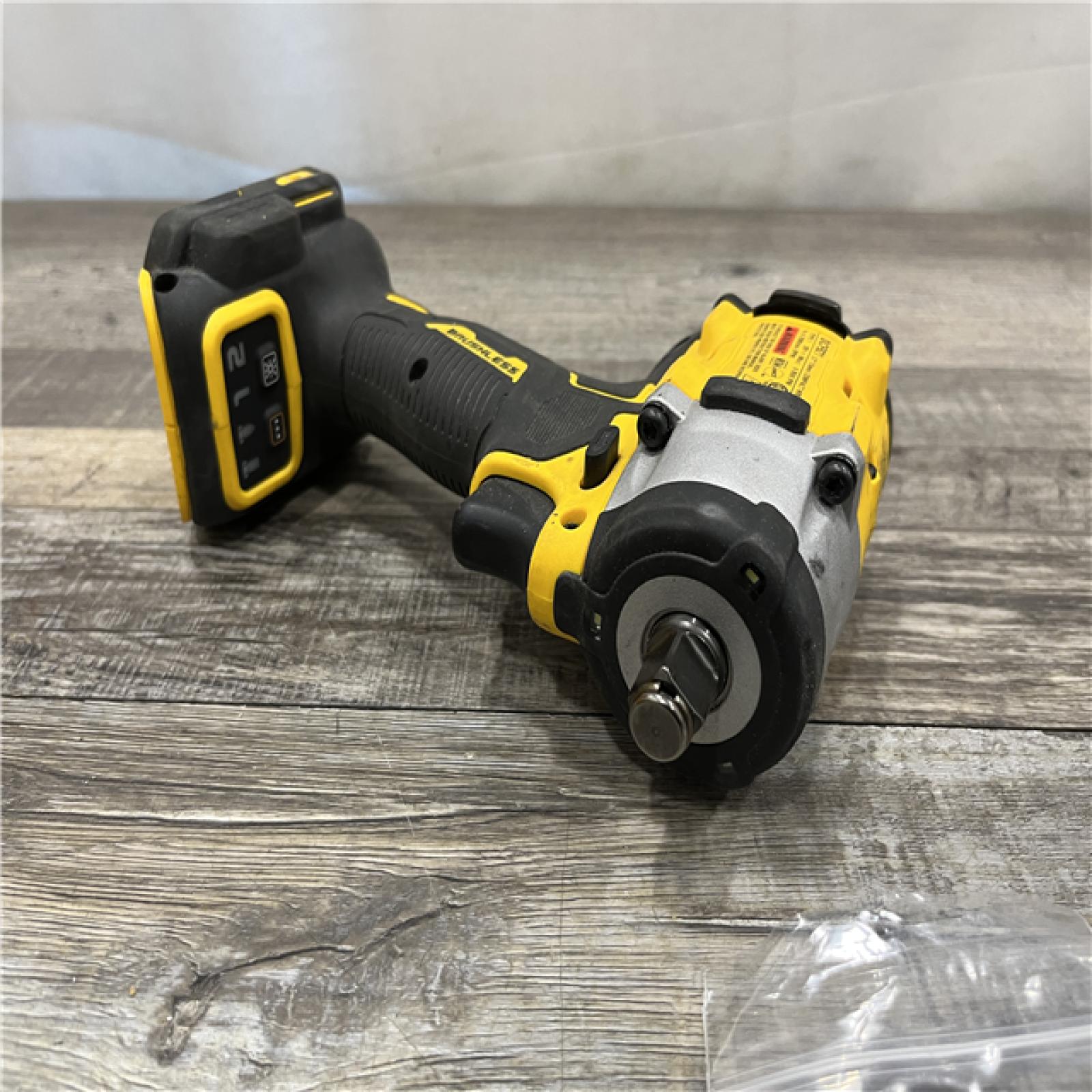 AS-IS DEWALT ATOMIC 20V MAX Cordless Brushless 1/2 in. Variable Speed Impact Wrench (Tool Only)