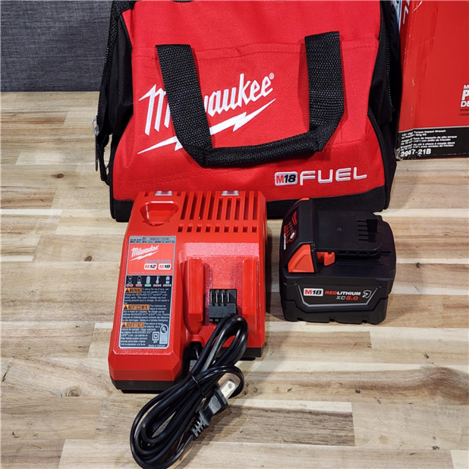 HOUSTON LOCATION - AS-IS (APPEARS LIKE NEW) Milwaukee FUEL 18V Lithium-Ion Brushless Cordless 1/2 in. Impact Wrench w/Friction Ring Kit
