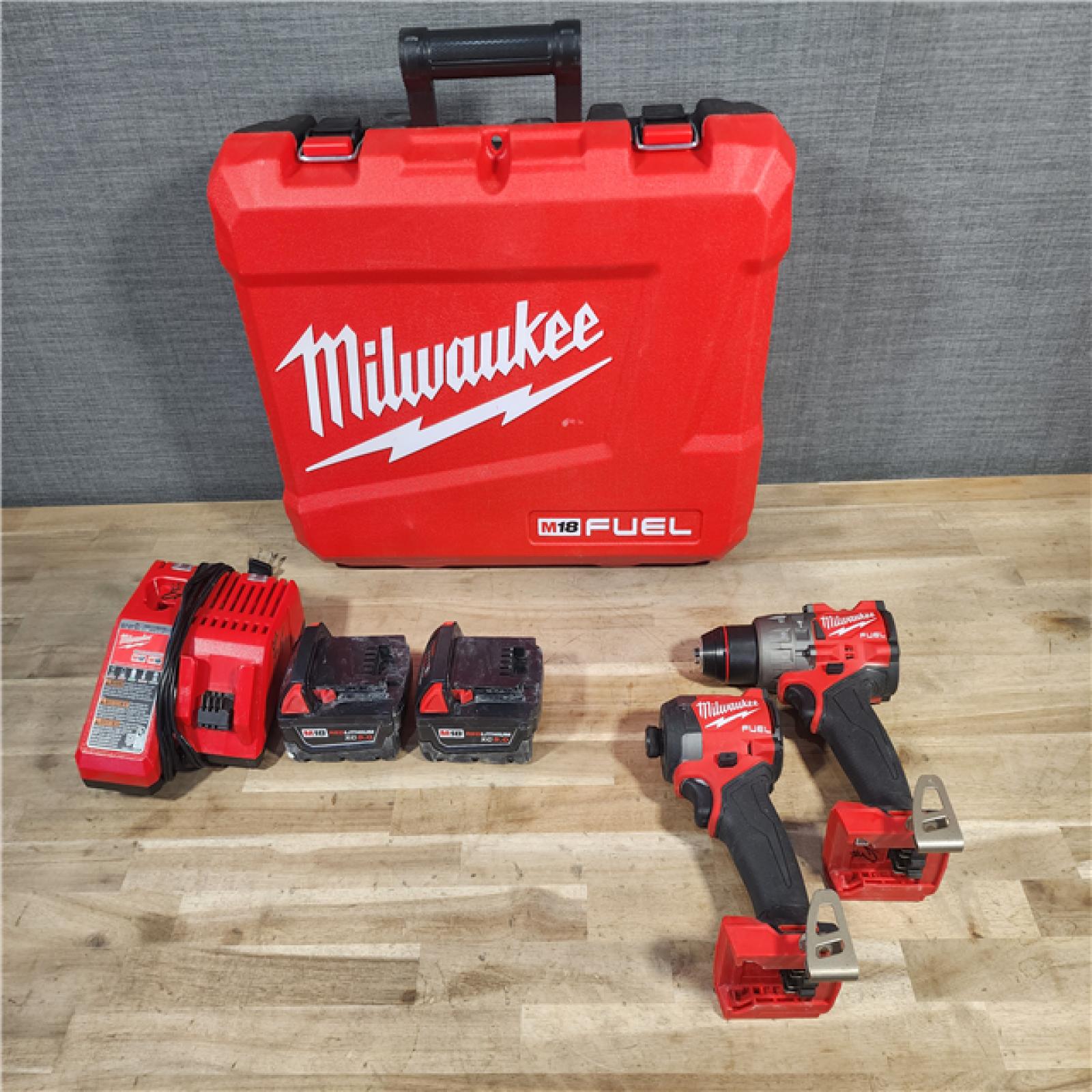 HOUSTON LOCATION - AS-IS MILWAUKEE FUEL 18V Lithium-Ion Brushless Cordless Hammer Drill and Impact Driver Combo Kit (2-Tool) with 2 Batteries