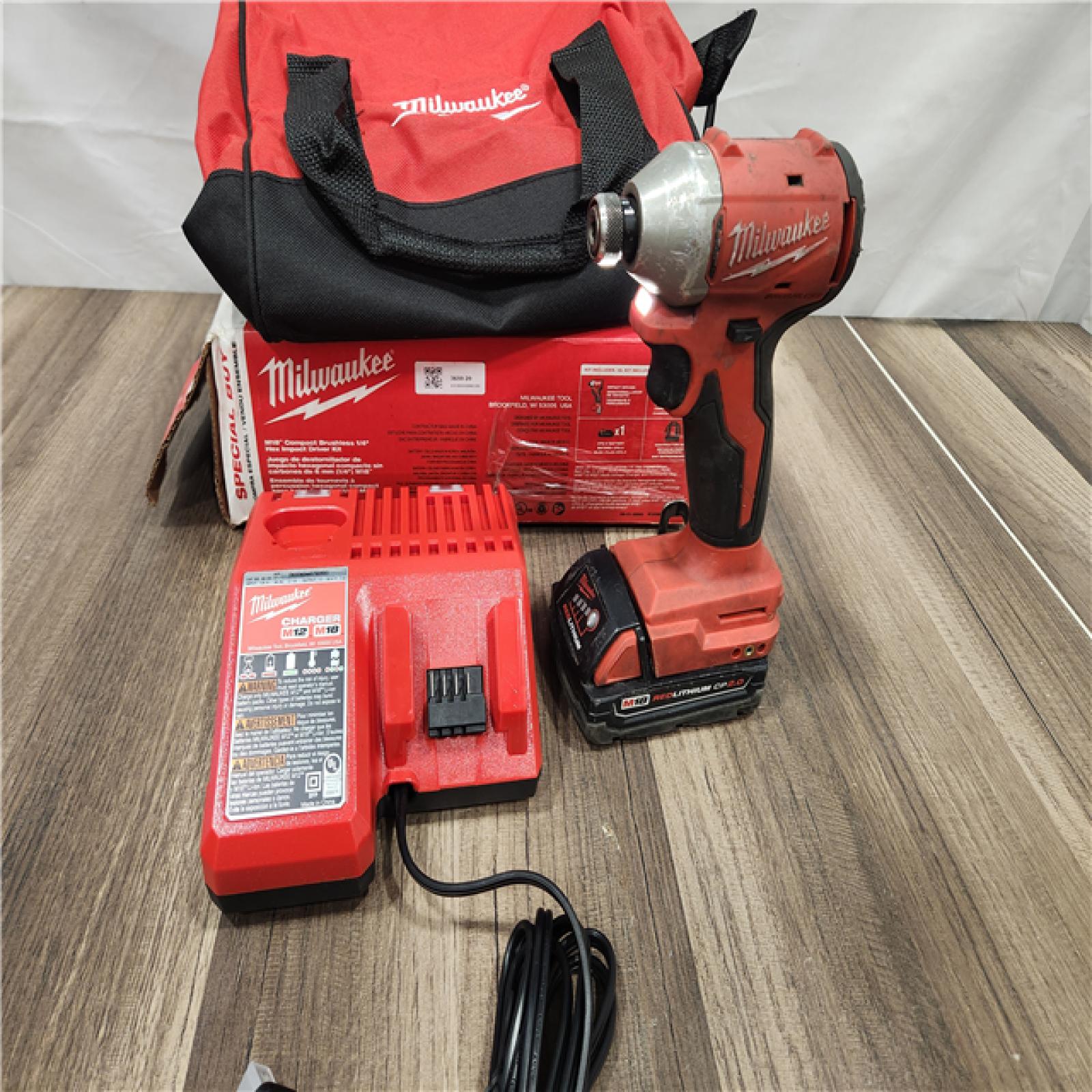 AS-IS  Milwaukee M18 Compact Brushless 1/4  Hex Impact Driver Kit