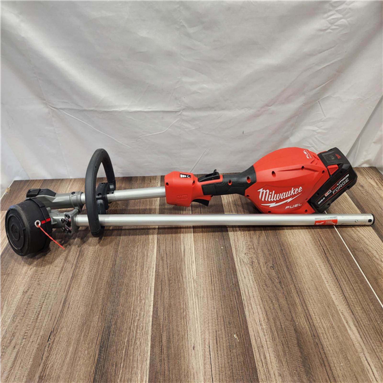 AS-IS- M18 FUEL 18V 16 in. Brushless Cordless Battery Powered String Trimmer W/QUIK-LOK Attachment Capability & 8.0 Ah Battery