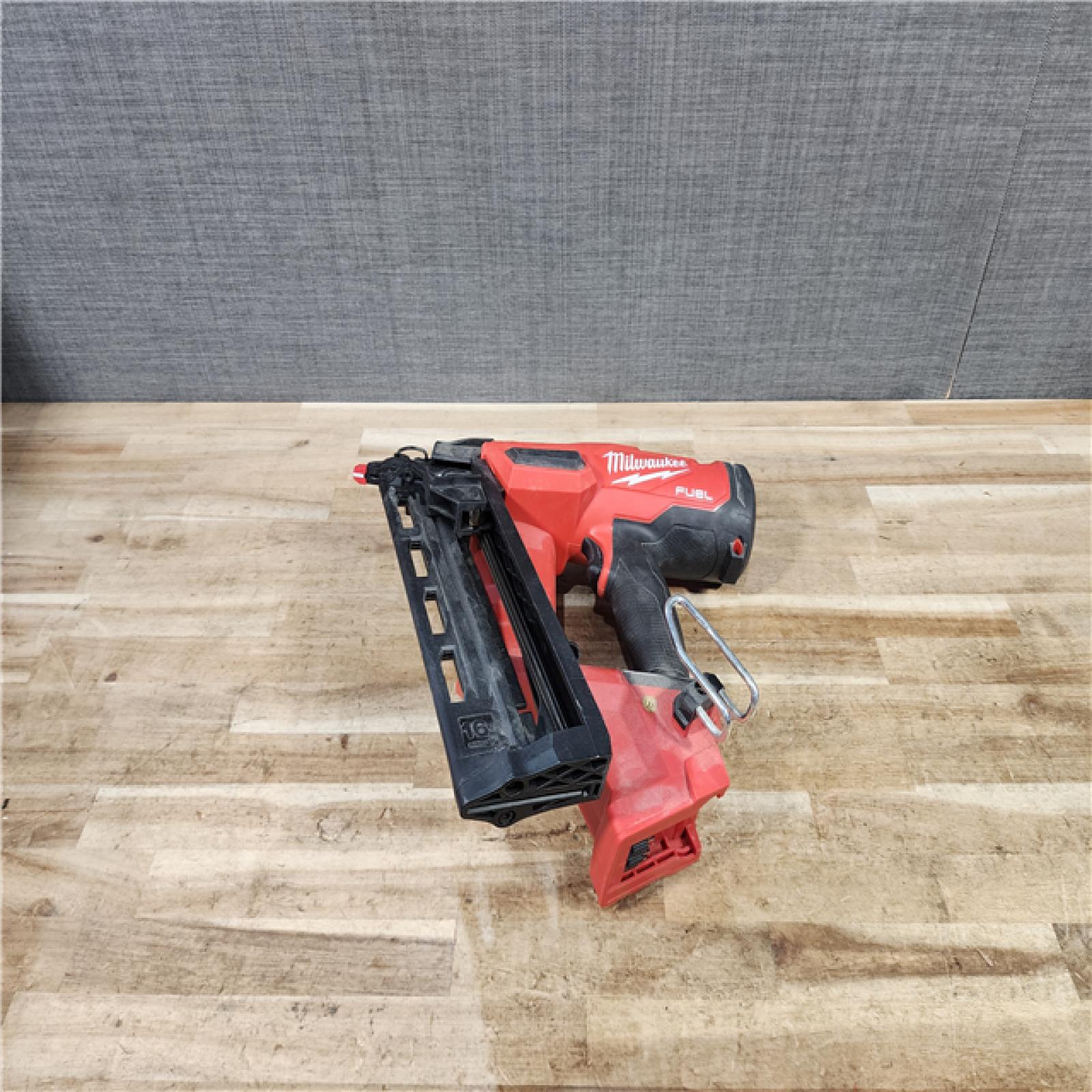 HOUSTON LOCATION - AS - IS Milwaukee FUEL 18-Volt Lithium-Ion Brushless Cordless Gen II 16-Gauge Angled Finish Nailer (Tool-Only)