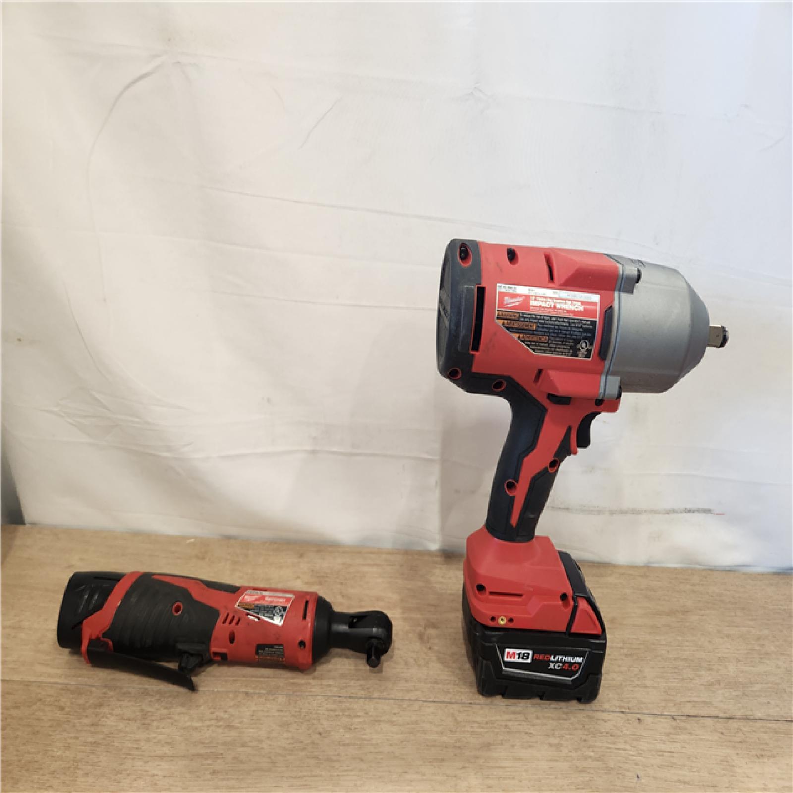 AS-IS- Milwaukee 12/18V Lithium-Ion Cordless 3/8 in. Ratchet and 1/2 in. High Torque Impact Wrench with Friction Ring Combo Kit