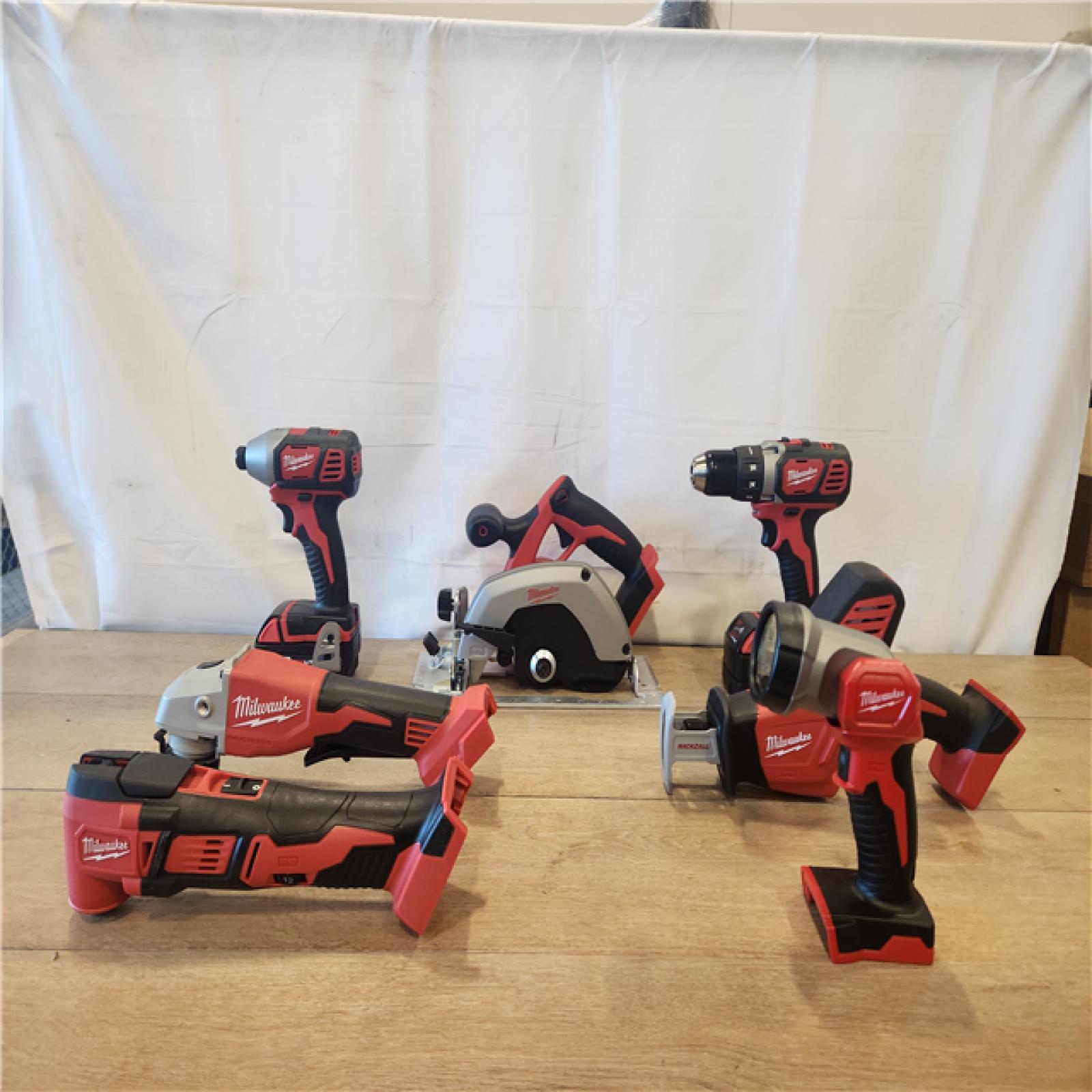 AS-IS- M18 18-Volt Lithium-Ion Cordless Combo Kit 7-Tool with 2-Batteries  Charger and Tool Bag