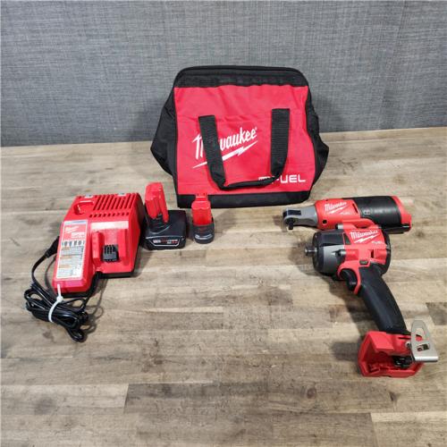 HOUSTON LOCATION - AS-IS MILWAUKEE 2 TOOL COMBO KIT W/ (2) BATTERY & CHARGER