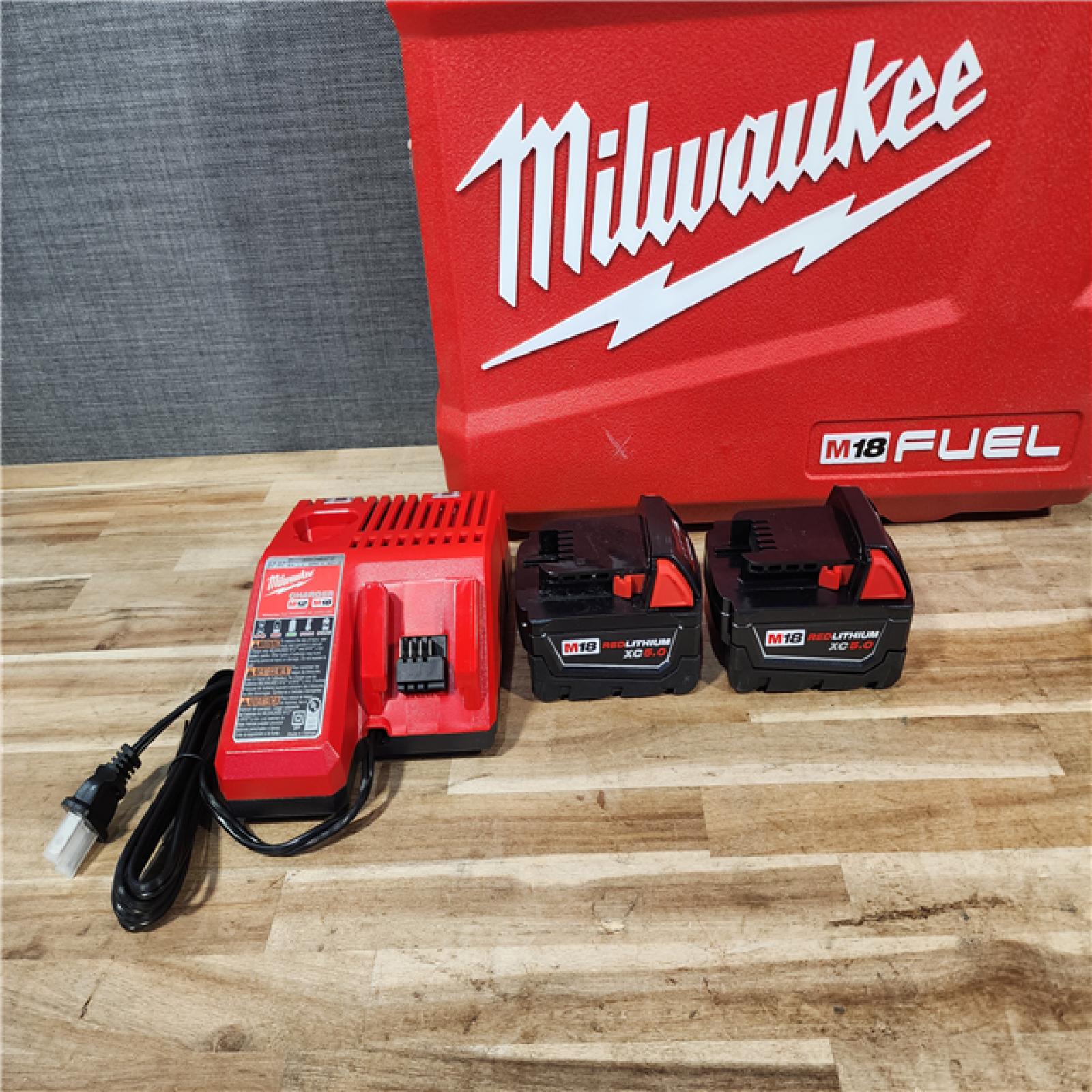 HOUSTON LOCATION - AS-IS (APPEARS LIKE NEW) Milwaukee FUEL 18V Lithium-Ion Brushless Cordless Hammer Drill and Impact Driver Combo Kit