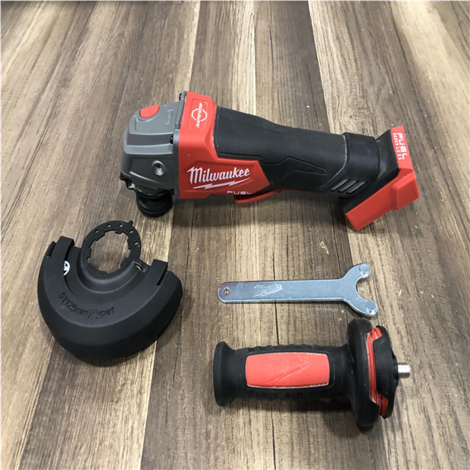 AS-IS Milwaukee FUEL 18V Lithium-Ion Brushless Cordless 4-1/2 in./5 in. Grinder w/Paddle Switch (Tool-Only)
